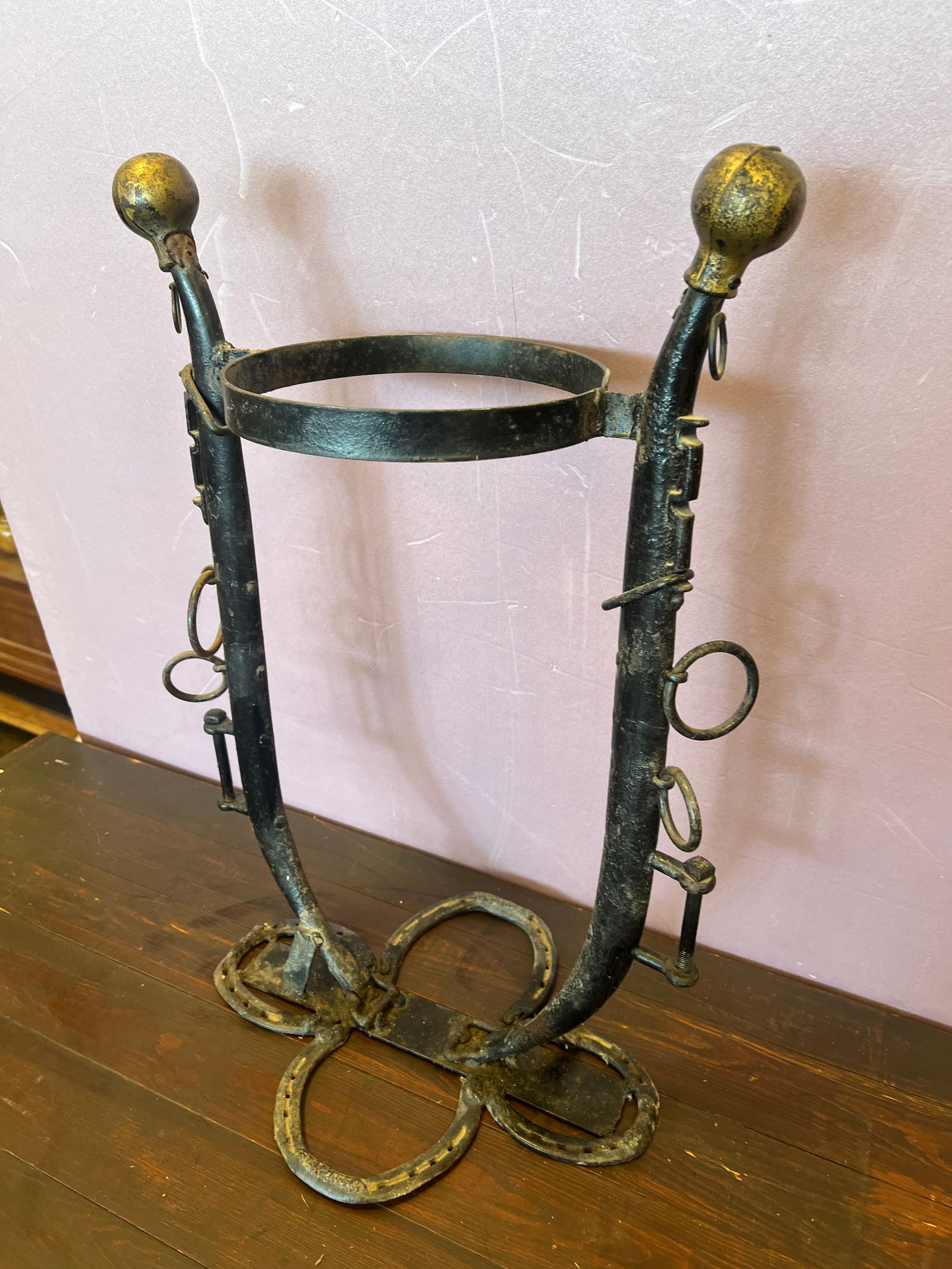 Folk Art Blacksmith Umbrella Stand: Folk Art Blacksmith Umbrella Stand. Made out horse collar and horseshoes