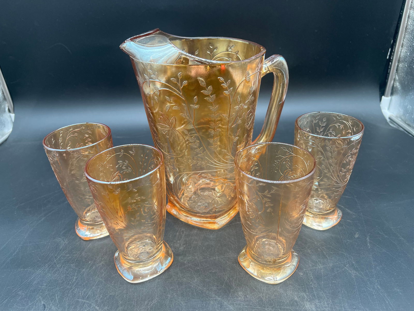 Set of 5 pc. Depression Glass Water Set: Set of 5 pc. Depression Glass Water Set. Jeannette Floragold - Iridescent Pattern. Pitcher and 4 Footed Tumblers