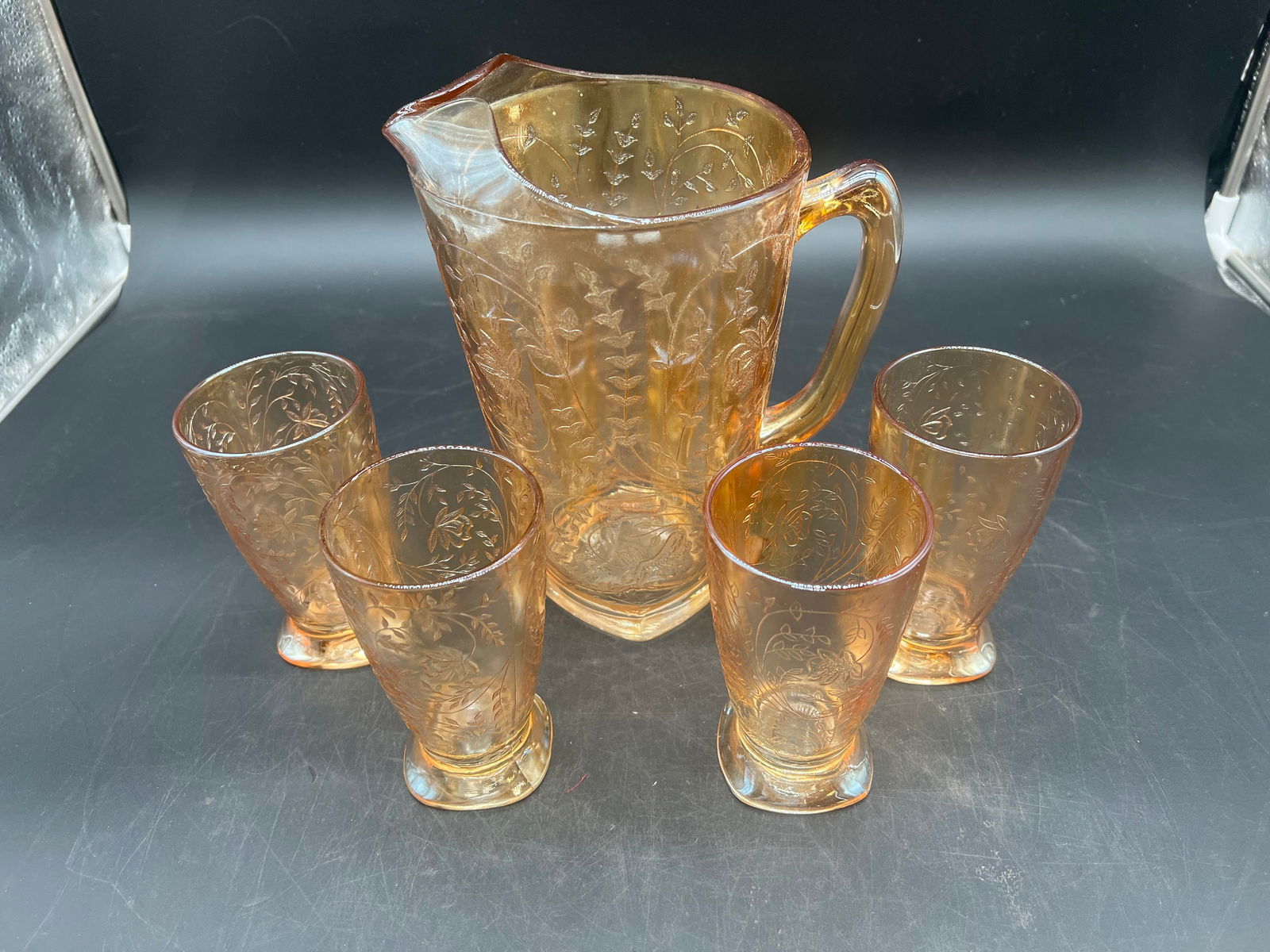 5 pc. Depression Glass Water Set: 5 pc. Depression Glass Water Set. Jeanette Floragold - Iridescent Pattern. Pitcher and 4 Footed Tumblers