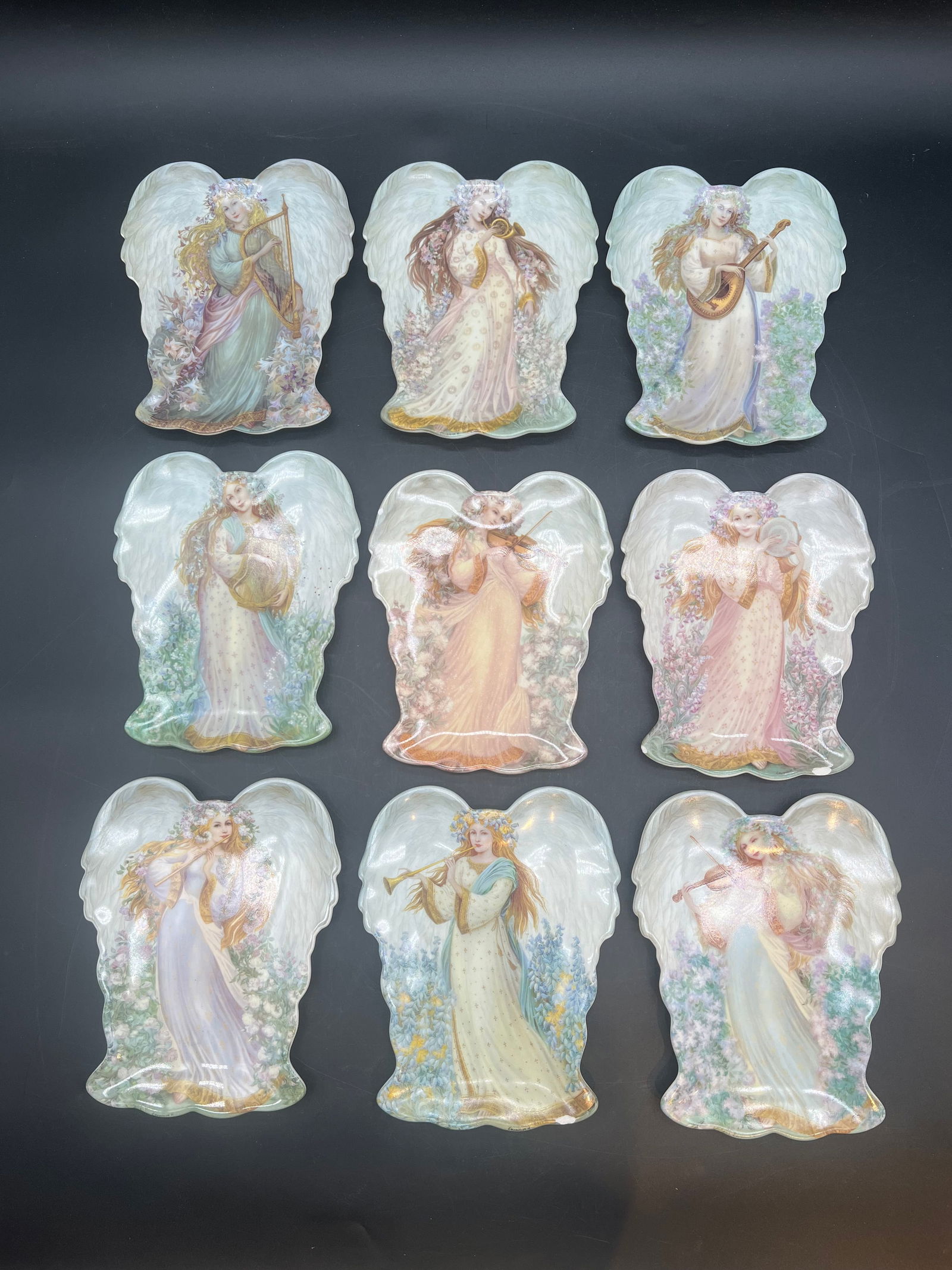 Lot of 9 Angel Wall Plaque: Lot of 9 Angel Wall Plaque. By Nadeghda Strelkina. "Serenty's Song", "Angelic Interlude", Celestial Song, Divine melody, Sublime harmony, Peaceful prelude, Hamrony's Hymn, Hevenly Celbratioin, Tranqui