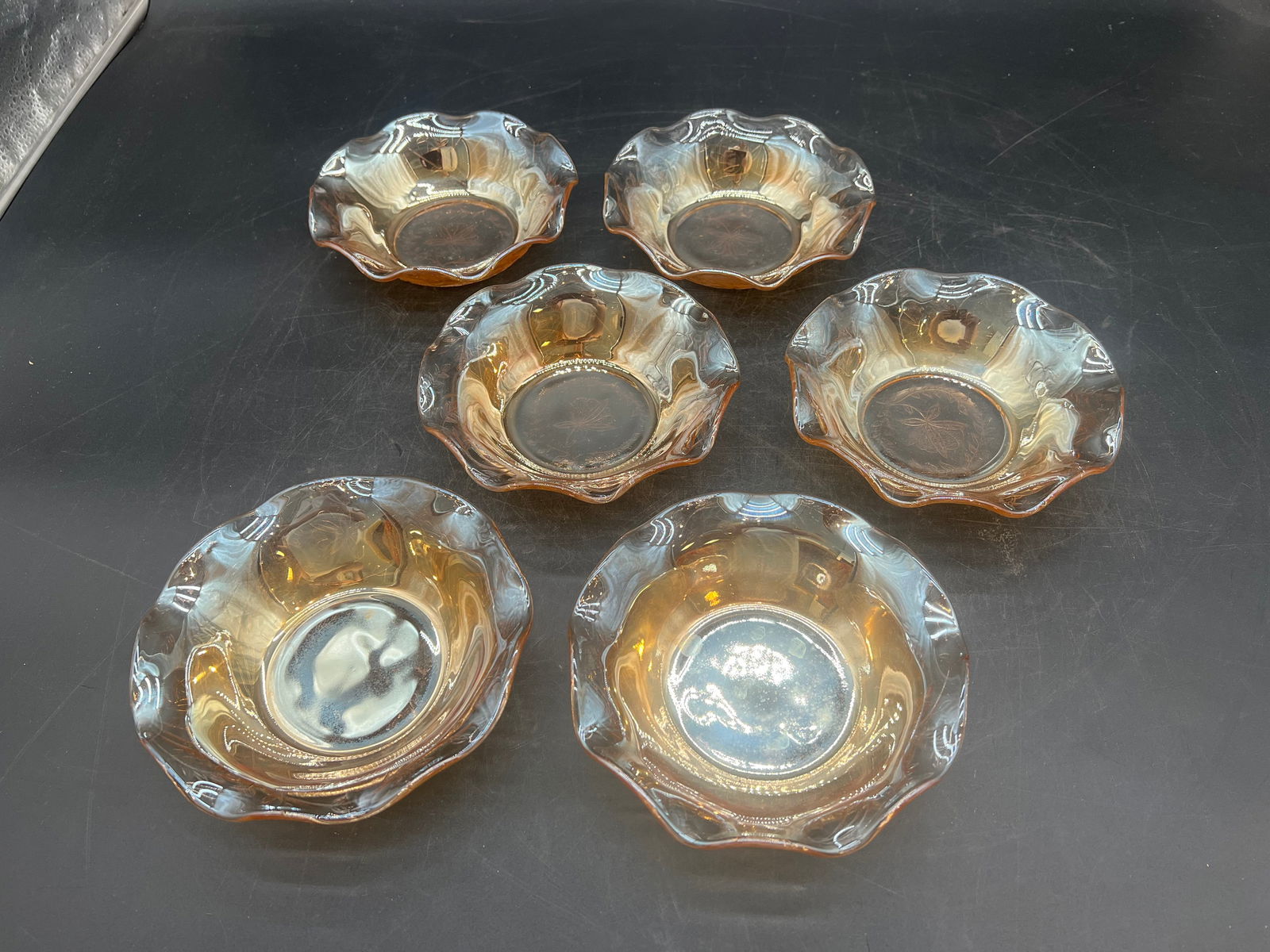 Pair of Carnival Glass Platters: Pair of Carnival Glass Platters. Jeanette Floragold - Iridescent Pattern.