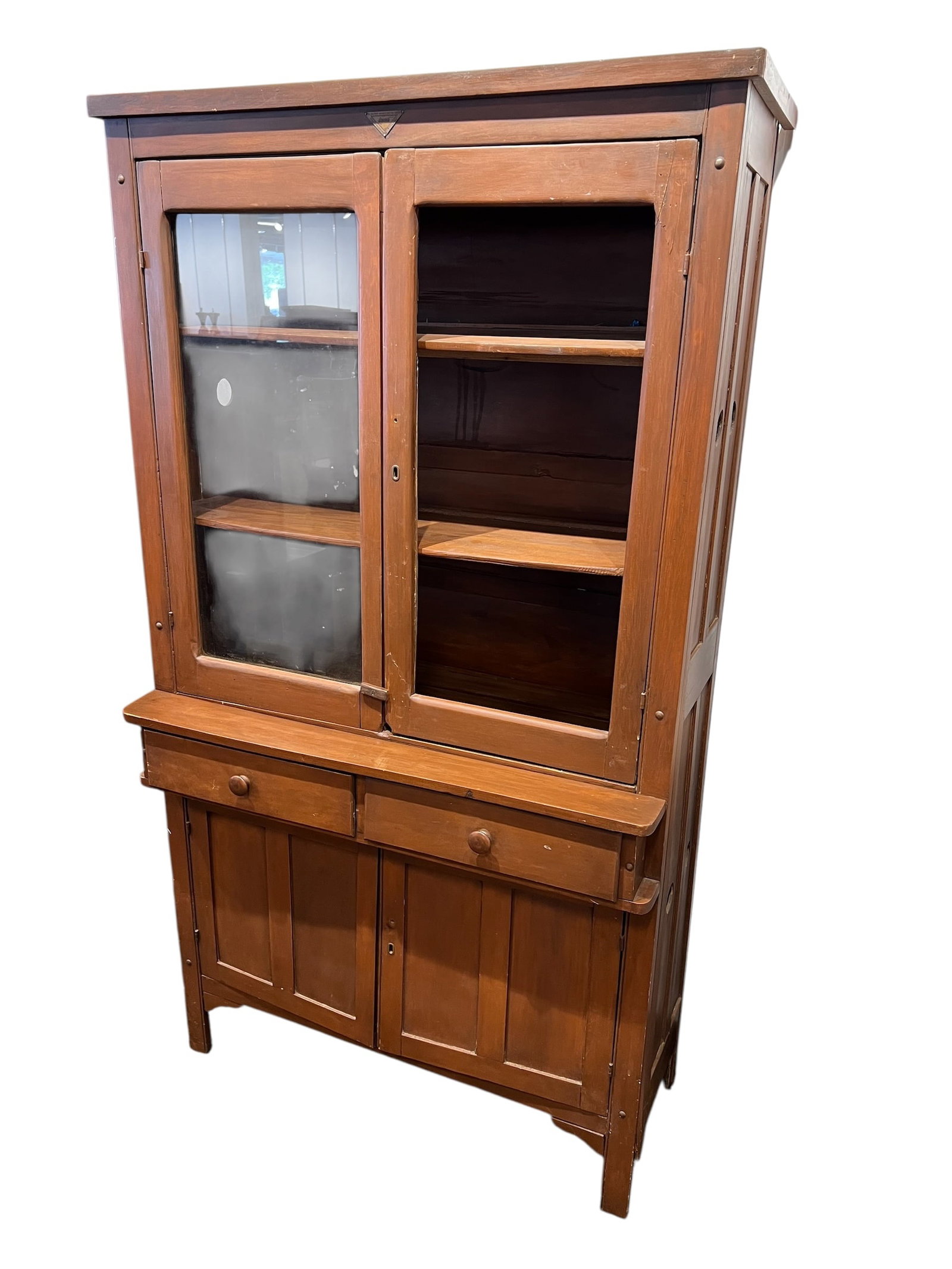 Antique Wooden Stepback Cupboard with Glass Front Doors.: Antique Wooden Stepback Cupboard with Glass Front Doors. This is a primitive antique farmhouse stepback hutch with a glass-front display top and a wooden base. Age and Style: These cabinets are freque