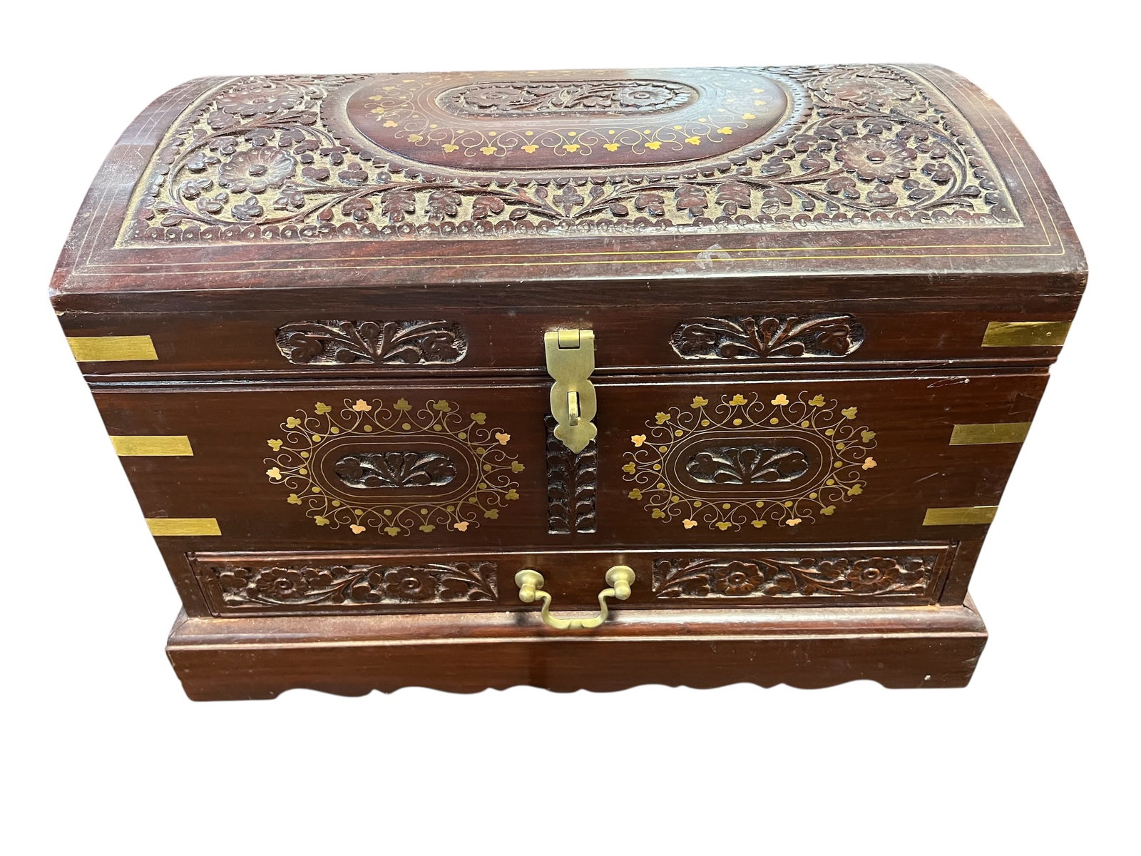 Hand Crafted Wooden Jewelry Box: This handcrafted wooden chest is a Zanzibar treasure chest or South Asian carved trunk, characterized by its intricate floral and geometric carvings and decorative brass inlay. Such chests are often c