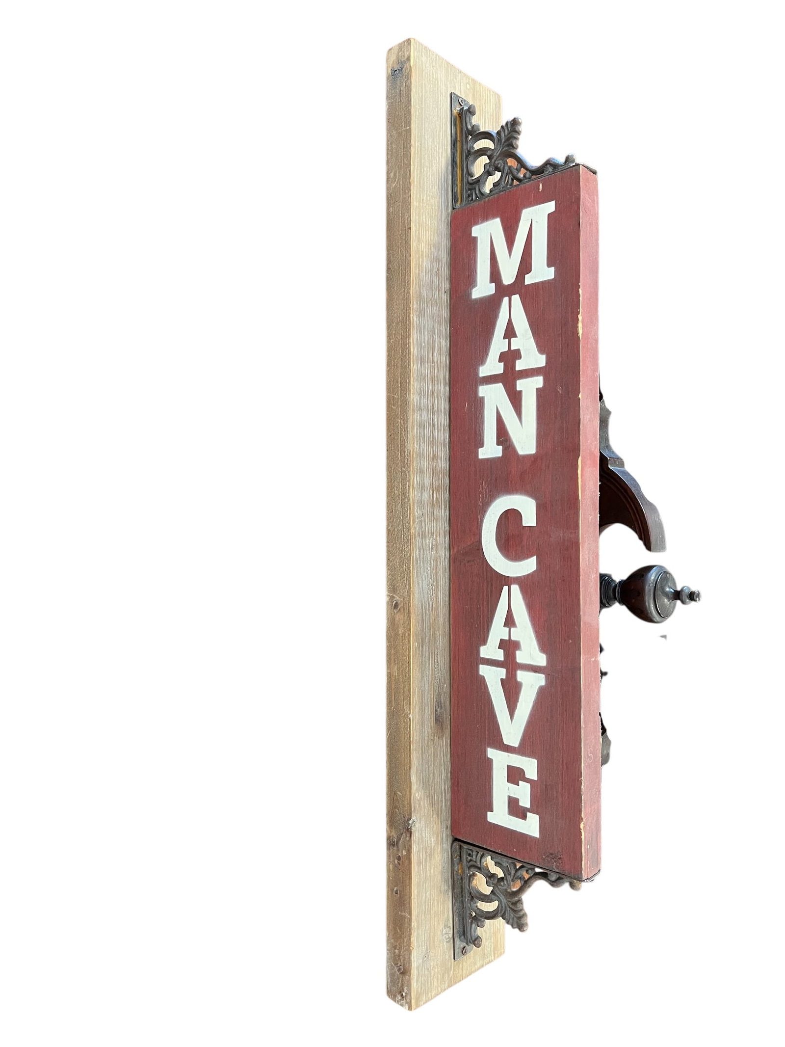 Early Mancave Sign: Early Mancave Sign.This rustic, handmade "Man Cave" sign features a double-sided design with a distressed antique finish. It is constructed from wood and accented with ornate metal brackets on either