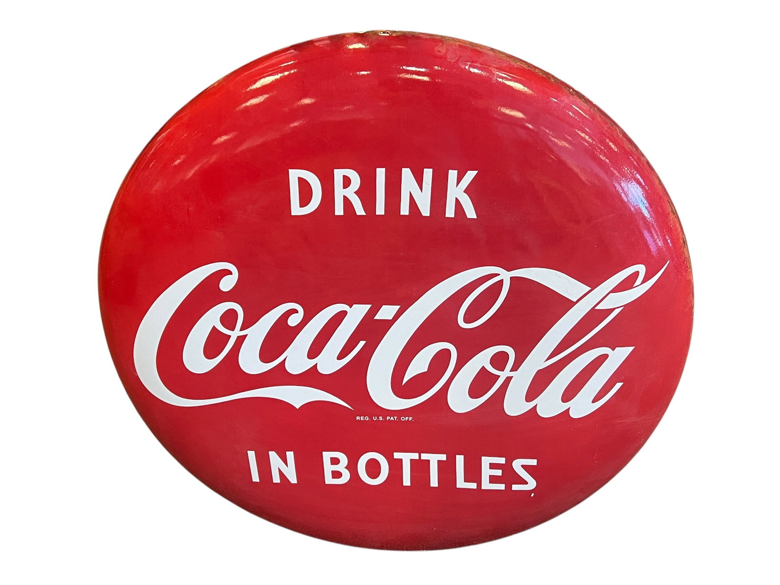 Coca Cola Button Advertising Sign: This is a 1950s porcelain enamel Coca-Cola button sign typically found in 24-inch or 36-inch diameters. [1, 2]Materials: These signs are made of porcelain enamel paint on heavy steel.Era: Most origina