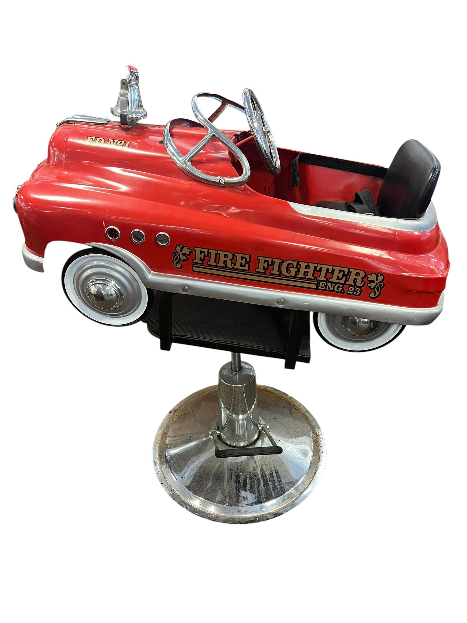 Fire Engine Barber Chair: This is a vintage-style children's fire truck salon styling chair, constructed by mounting a classic Comet "Fire Fighter Engine 23" metal pedal car onto a heavy-duty hydraulic barber base. [1, 2]Key D