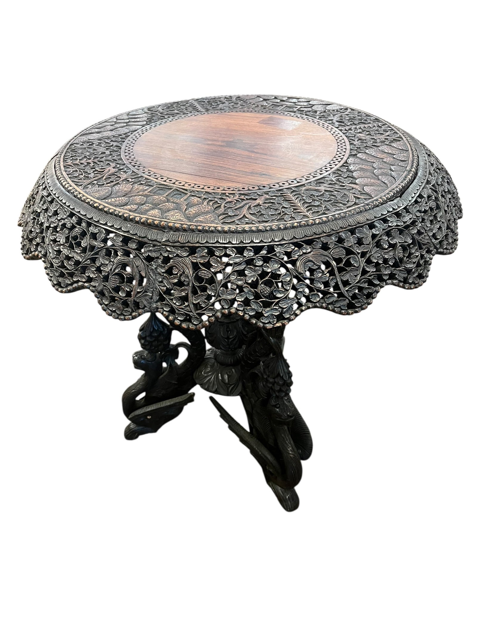 Black Forest Lamp Table: This item is a late 19th-century hand-carved Anglo-Indian / Burmese occasional side table, crafted during the British Colonial Raj period around 1880. [1, 2]Key Characteristics & FeaturesIntricate