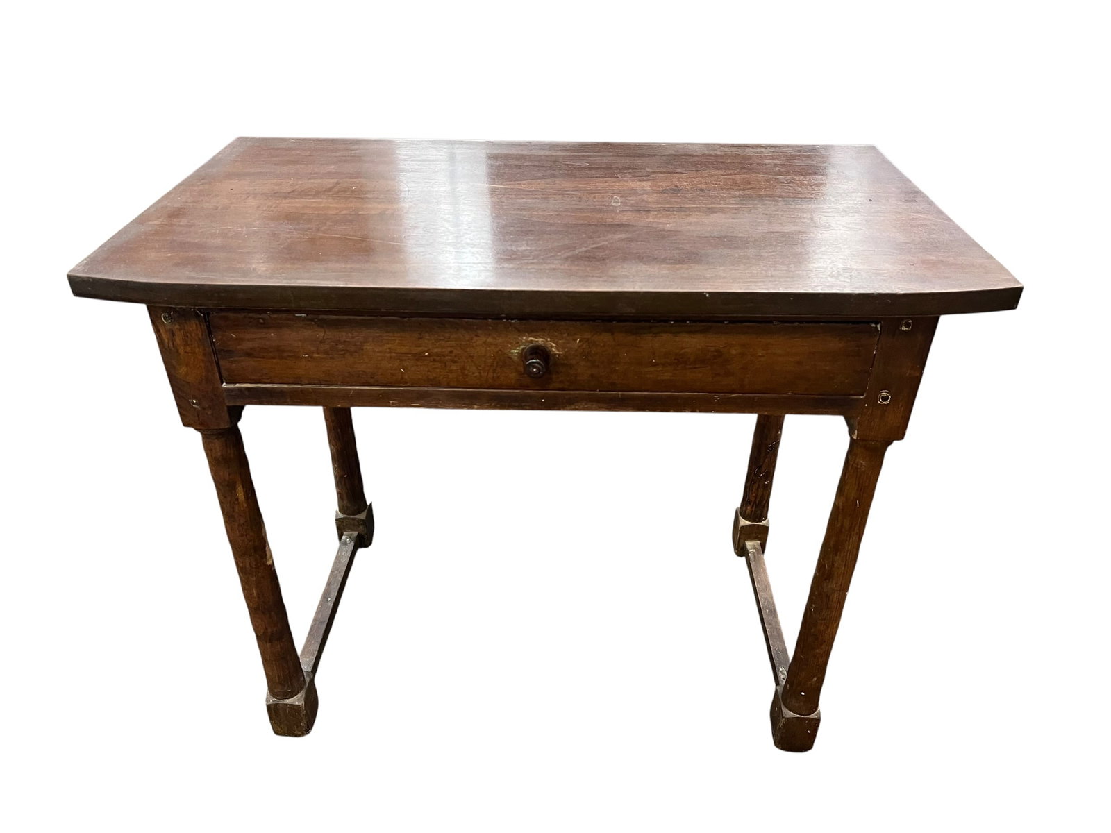 Walnut 1 Drawer Stand: This is a French farmhouse table from the 18th or 19th century made of walnut or oak. [1, 2]Design: It features a single drawer, chamfered square legs, and cross-stretchers for stability.Material: