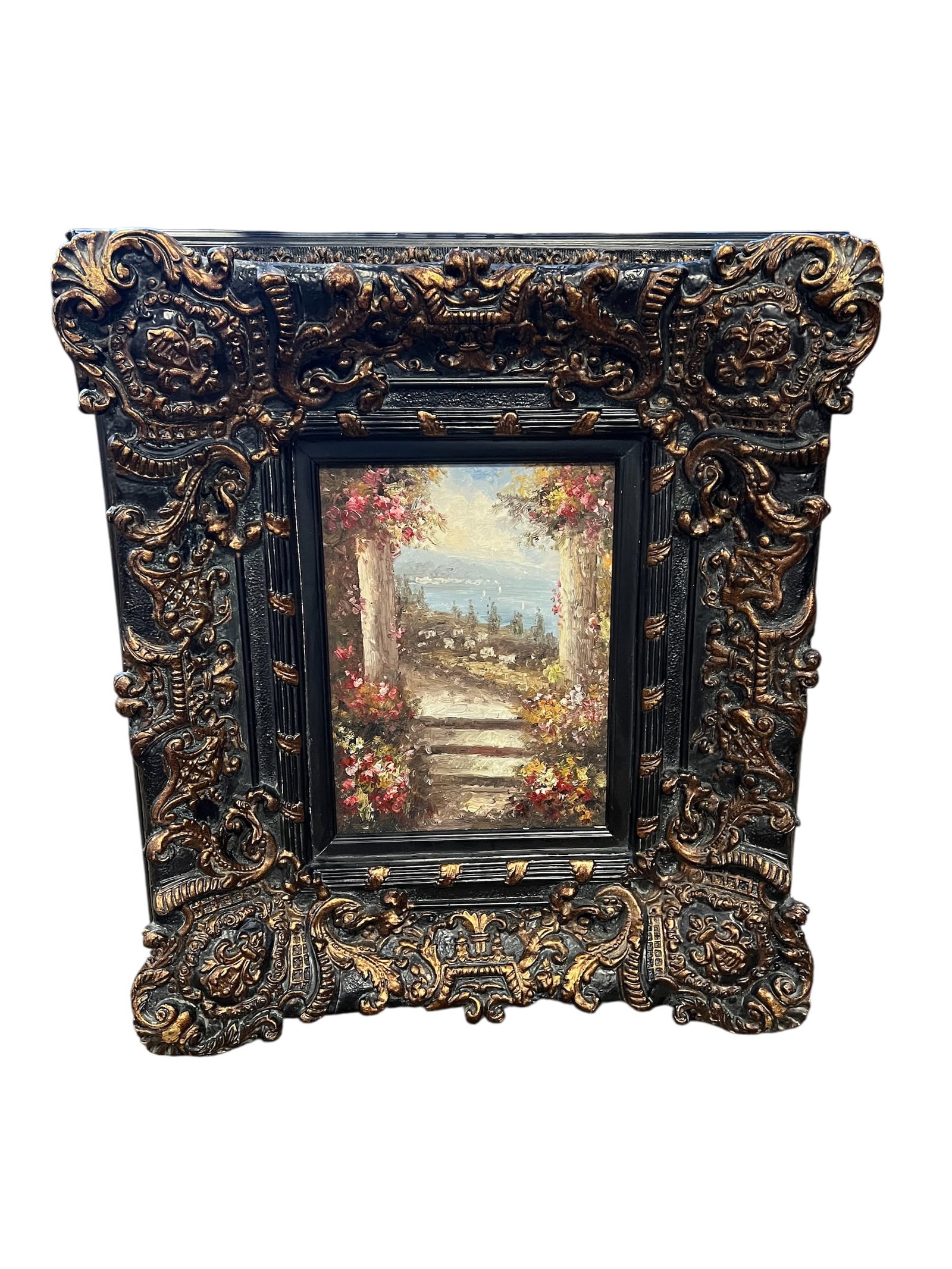 Small Painting in Jesso Frame: This is a framed Mediterranean or Italian-style landscape painting, featuring a courtyard scene with flowers and a path leading toward the ocean. [1, 2]Artwork Style: The painting is in an impasto