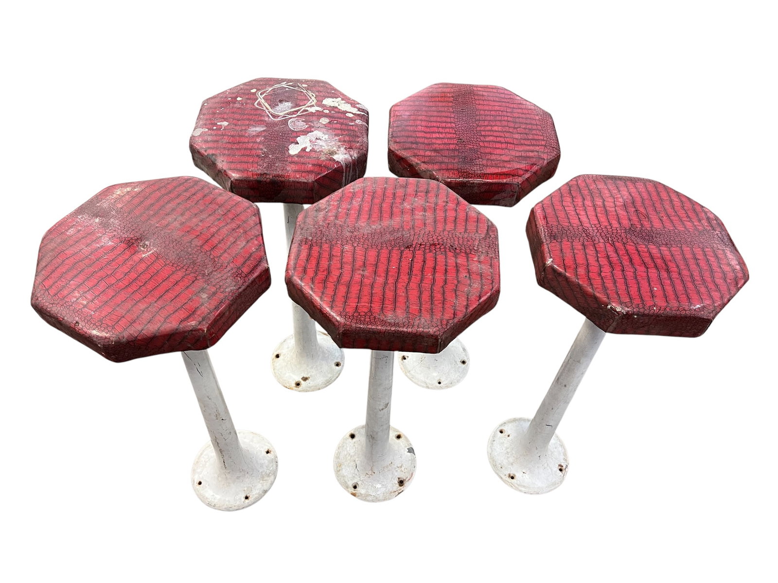 Lot of 5 Early Barstools`: These items are vintage floor-mount diner or soda fountain counter stools. They feature unique, octagonal padded seats upholstered in a red faux-alligator or reptile-textured vinyl, supported by