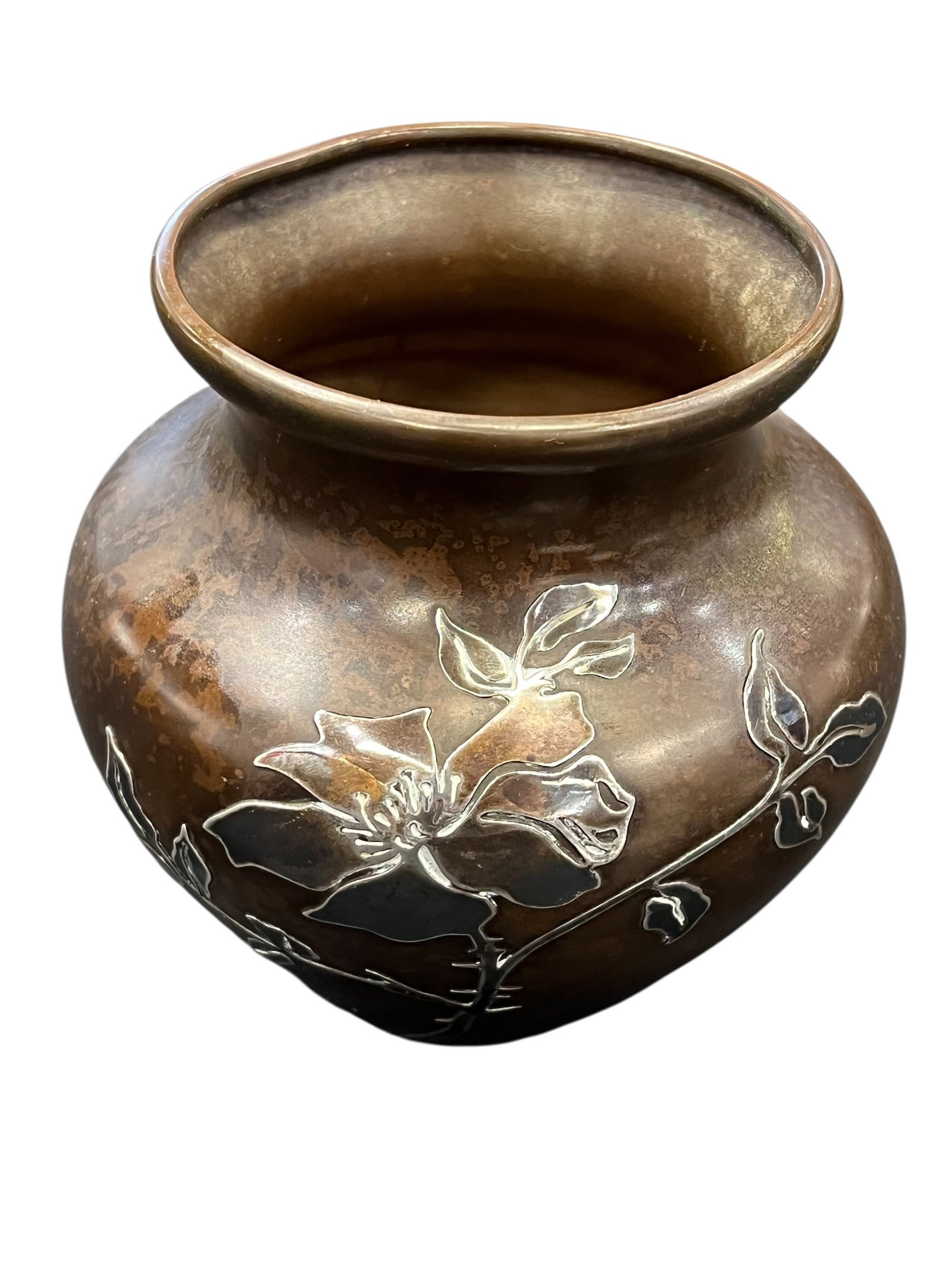 Bronze Flower Vase: This is a Heintz Sterling on Bronze Vase featuring an Art Nouveau floral motif and a distinctive patina.Manufacturer: Heintz Art Metal Shop, known for patented silver-overlay techniques on