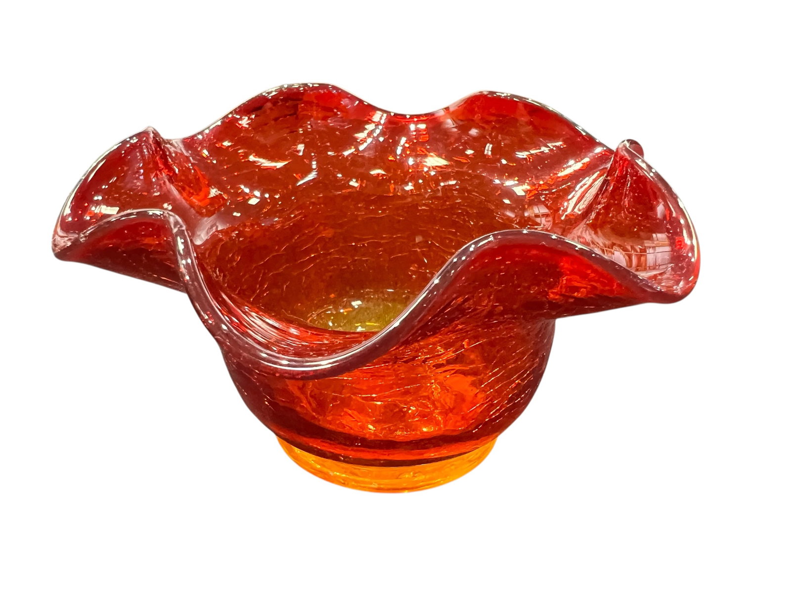 vintage Kanawha or Blenko Amberina crackle glass bowl: This is a vintage Kanawha or Blenko Amberina crackle glass bowl featuring a vibrant red-to-orange gradient and a distinctively ruffled edge.Glass Technique: The bowl is crafted using a crackle glass t