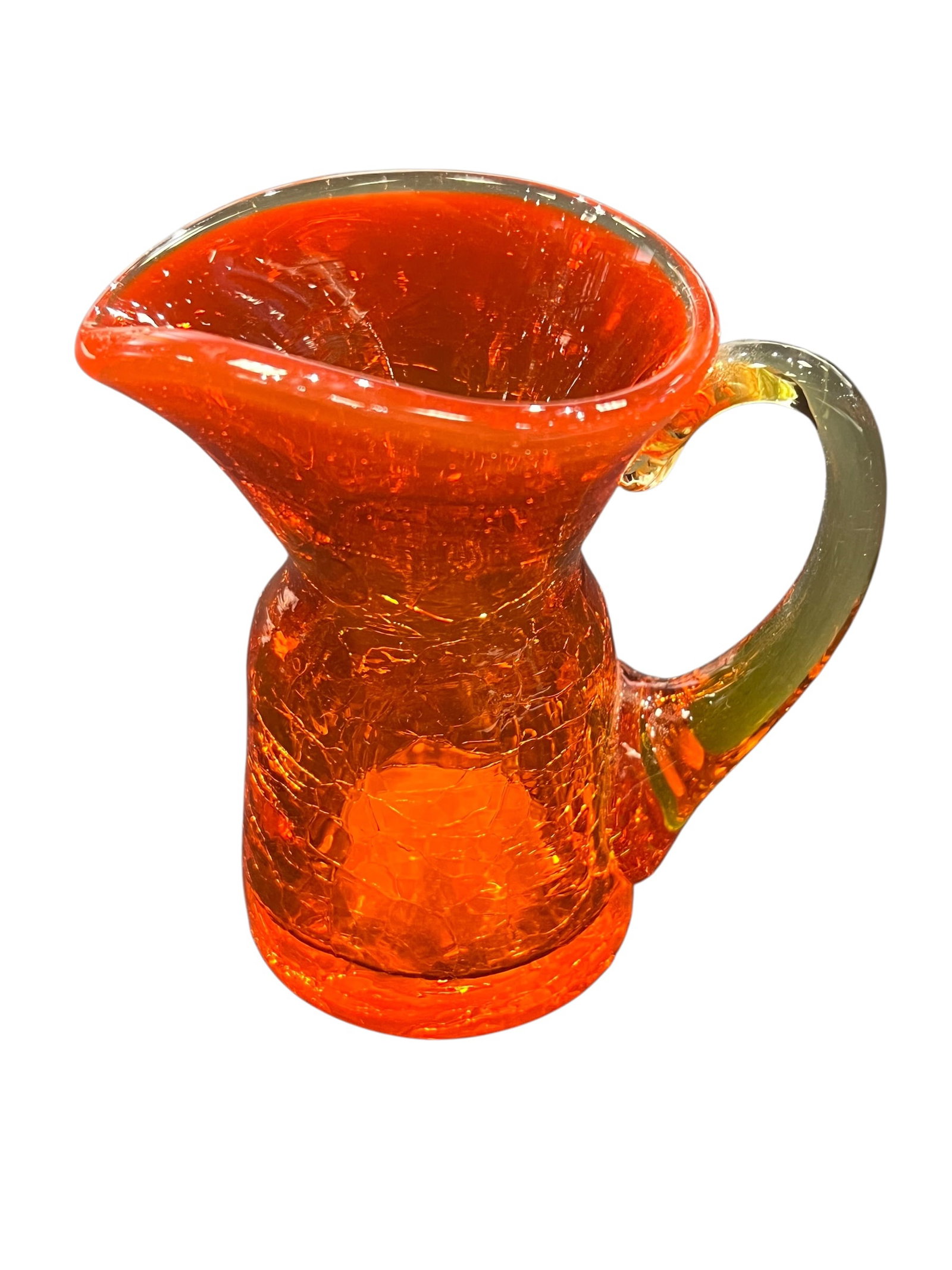 vintage Amberina crackle glass pitcher: These are vintage Amberina crackle glass pitchers, often featuring an applied handle and hand-blown construction. [1, 2]Color Profile: The glass transitions from a yellow or amber base to a vibrant re