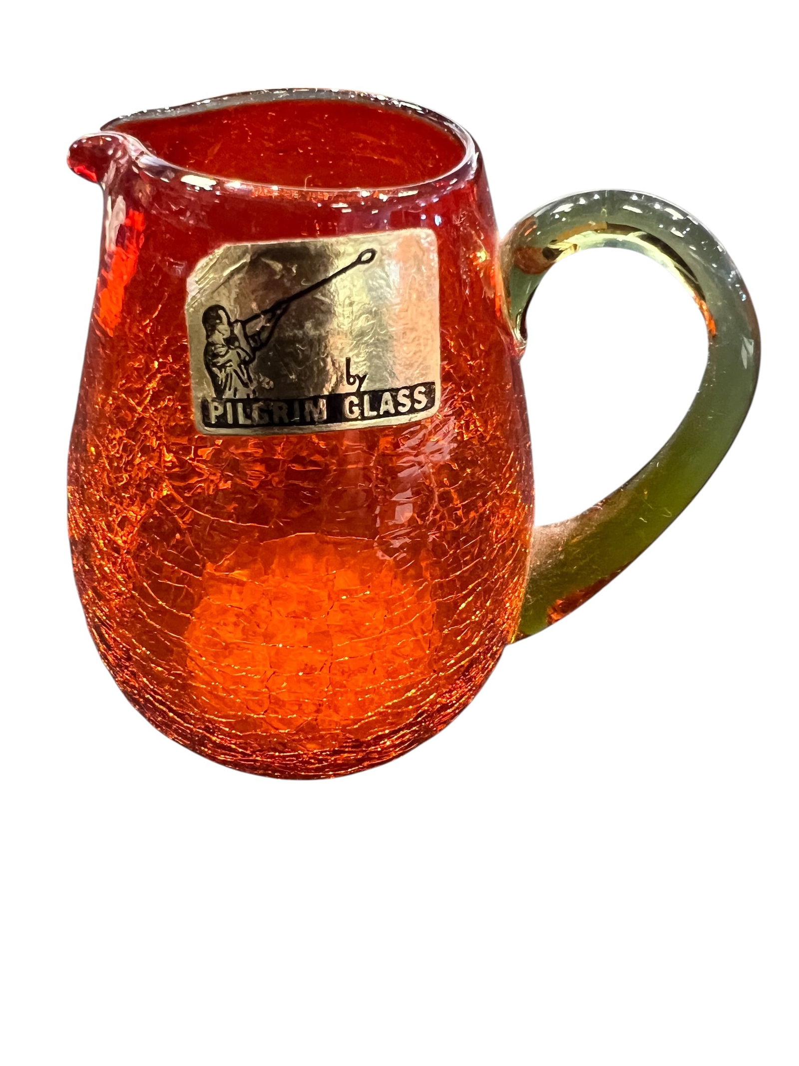 vintage mid-century crackle glass mini pitcher: This item is a vintage mid-century crackle glass mini pitcher produced by the Pilgrim Glass Corporation, an iconic American art glass company based in Ceredo, West Virginia. [1, 2, 3, 4, 5]The piece f