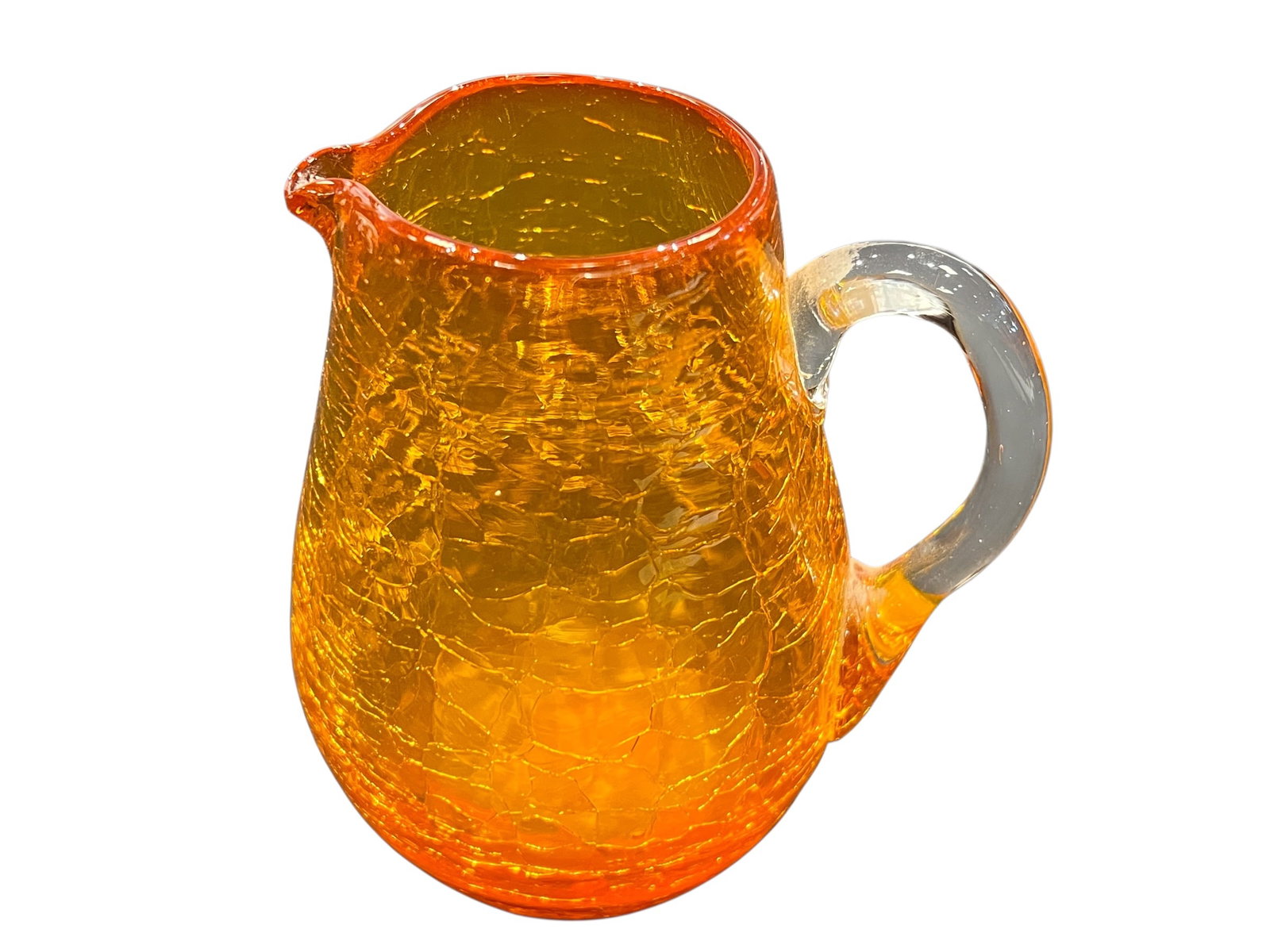 vintage mid-century modern tangerine/orange crackle glass miniature pitcher: This item is a vintage mid-century modern tangerine/orange crackle glass miniature pitcher (or creamer), most likely produced in West Virginia by a company like the Pilgrim Glass Corporation or Kanawh
