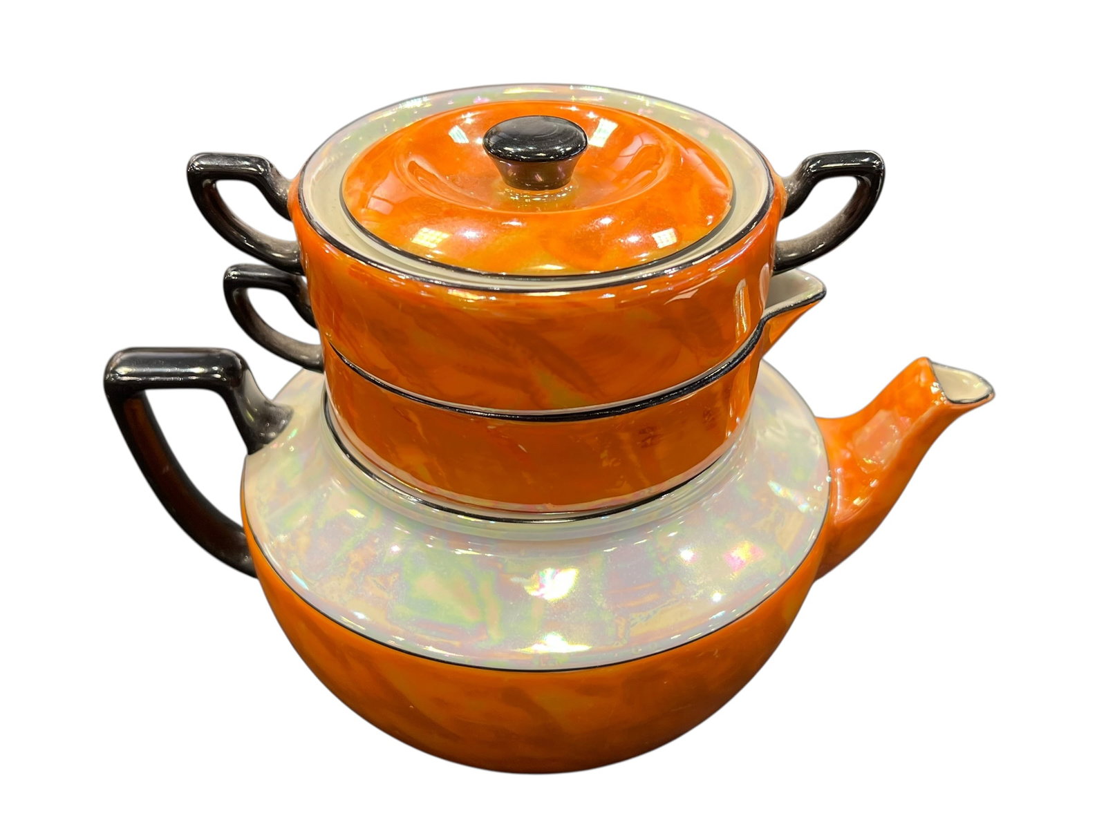 vintage 1930s Art Deco stacking tea set,: This image shows a vintage 1930s Art Deco stacking tea set, commonly referred to as a "tea-for-one" or "stacked" service. [1]Design FeaturesMaterial & Finish: The set is crafted from ceramic finished