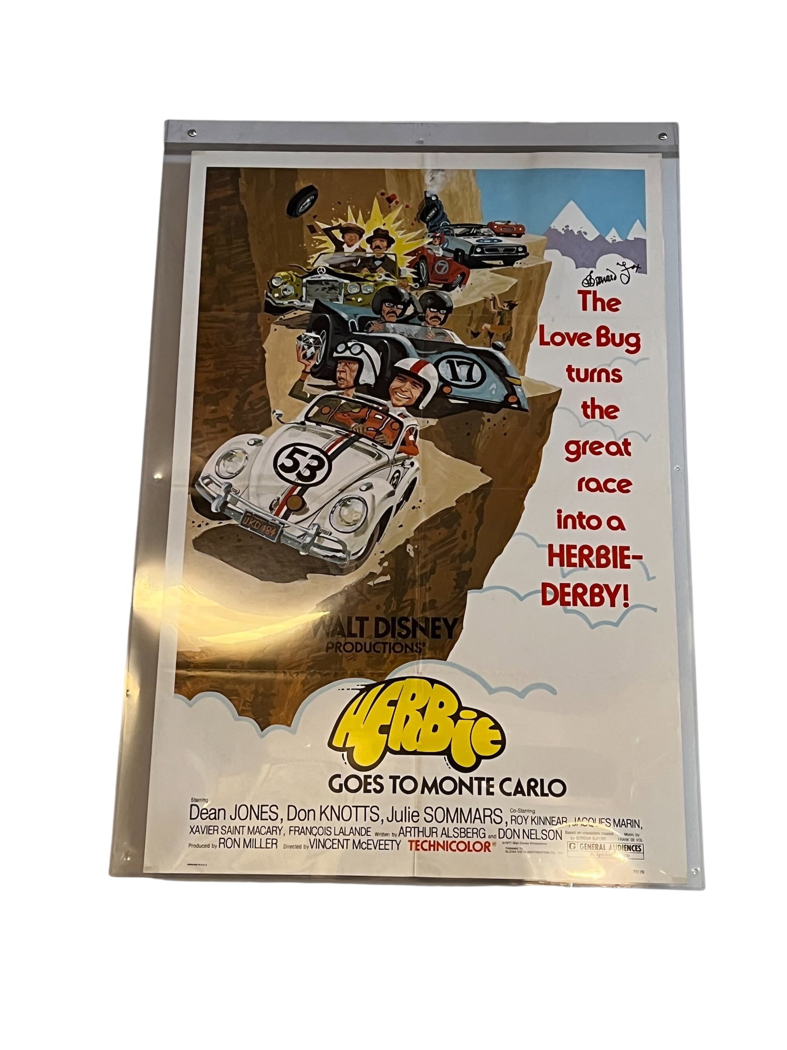 Benard Fox Autographed Herbie Goes to Monte Carlo Movie Poster: The image shows an original movie poster for the 1977 Walt Disney Productions film, Herbie Goes to Monte Carlo.Key DetailsMain Stars: Dean Jones, Don Knotts, and Julie Sommars.Tagline: "The Love Bug t