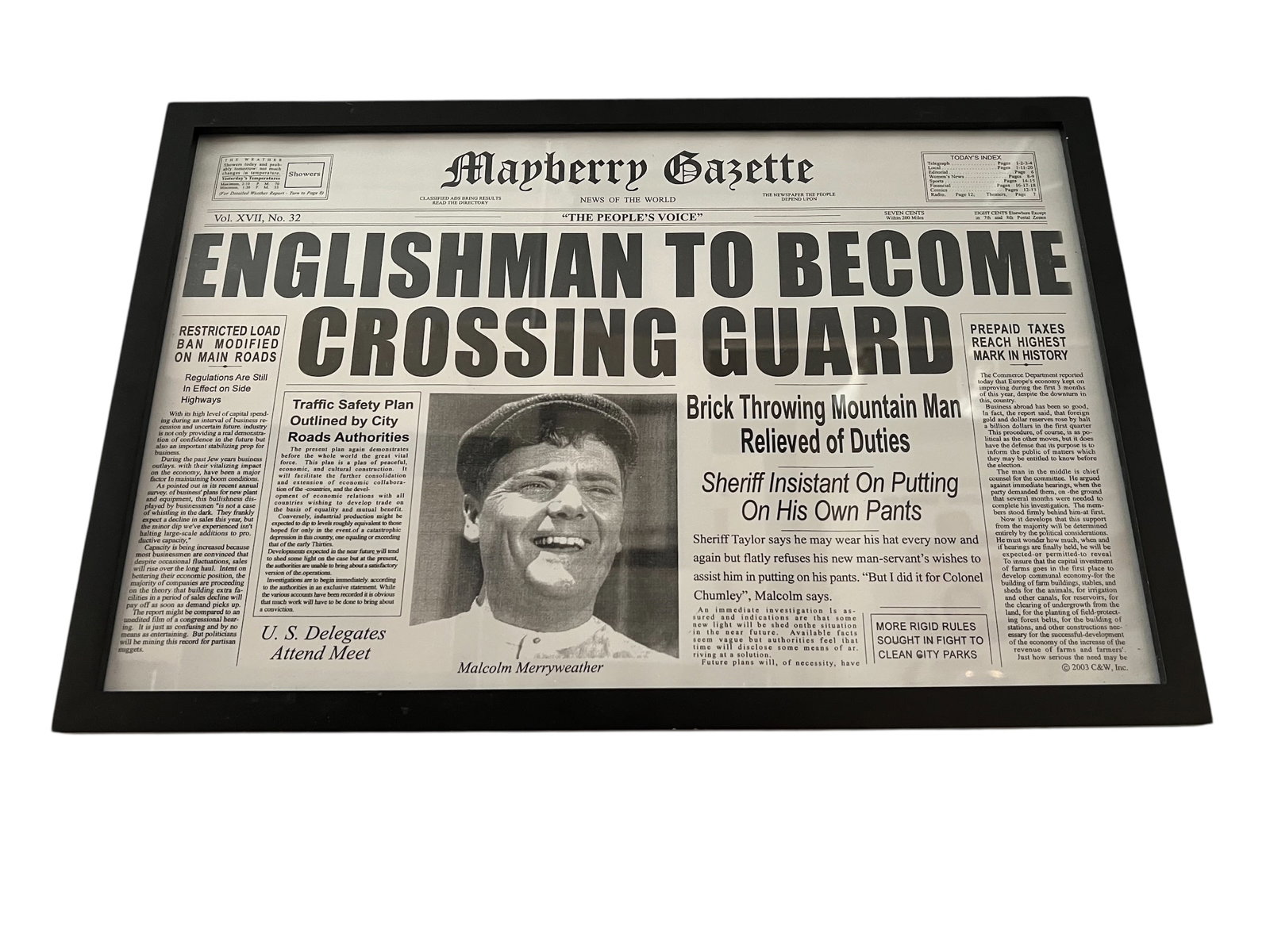 Framed Newspaper Print Prop from The Andy Griffith Show: This framed newspaper print is a detailed prop replica of the Mayberry Gazette from the classic television series, The Andy Griffith Show.Key Details & ReferencesMain Headline: "Englishman to Become C