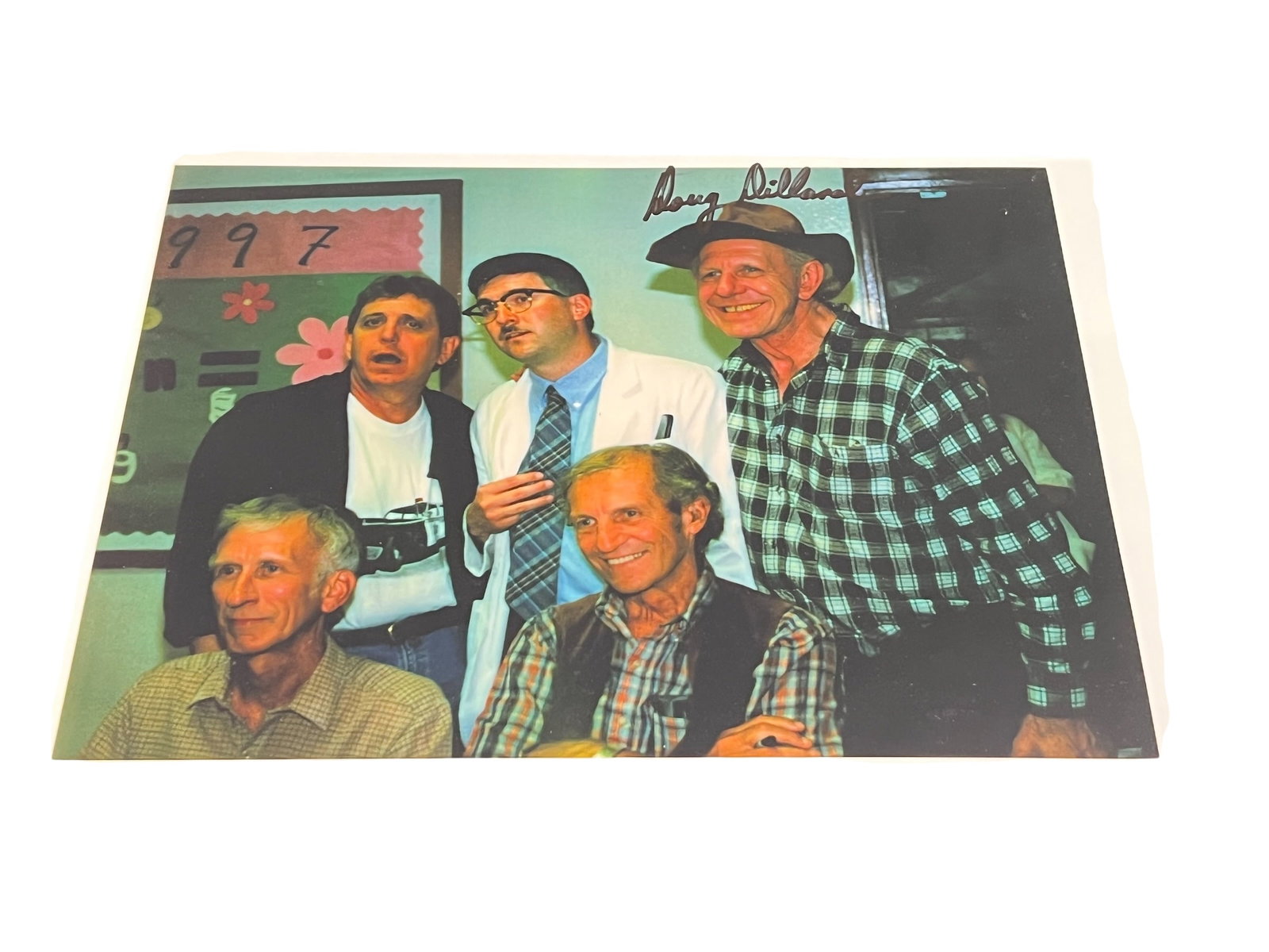 Signed Photograph: This image shows a signed photograph of George Lindsey, known for his role on The Andy Griffith Show. [1]The photo appears to be from an Andy Griffith Show reunion.It features George Lindsey in the
