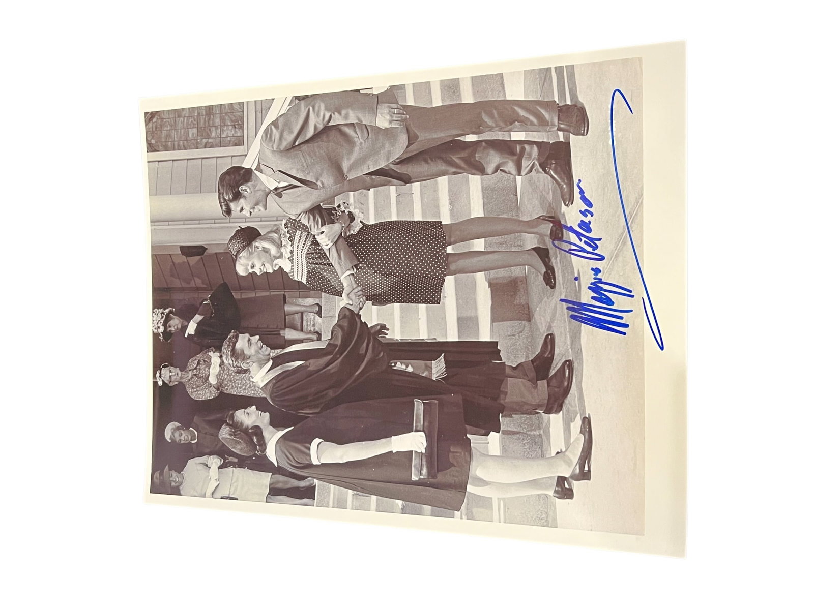 Signed Photograph: This photograph is signed by Mickey Carroll, known for his role as a Munchkin in The Wizard of Oz. [1, 2]Subject: Mickey Carroll, a famed actor from the 1939 film The Wizard of Oz.Signature: The 8x10