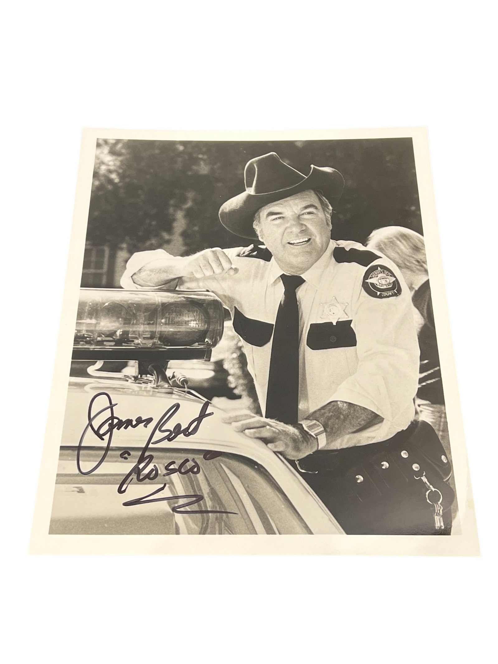 Signed James Best Photograph: This image shows a black and white 8x10 photo of James Best as Sheriff Rosco P. Coltrane from The Dukes of Hazzard, which may include a certificate of authenticity. [1]James Best was a prolific