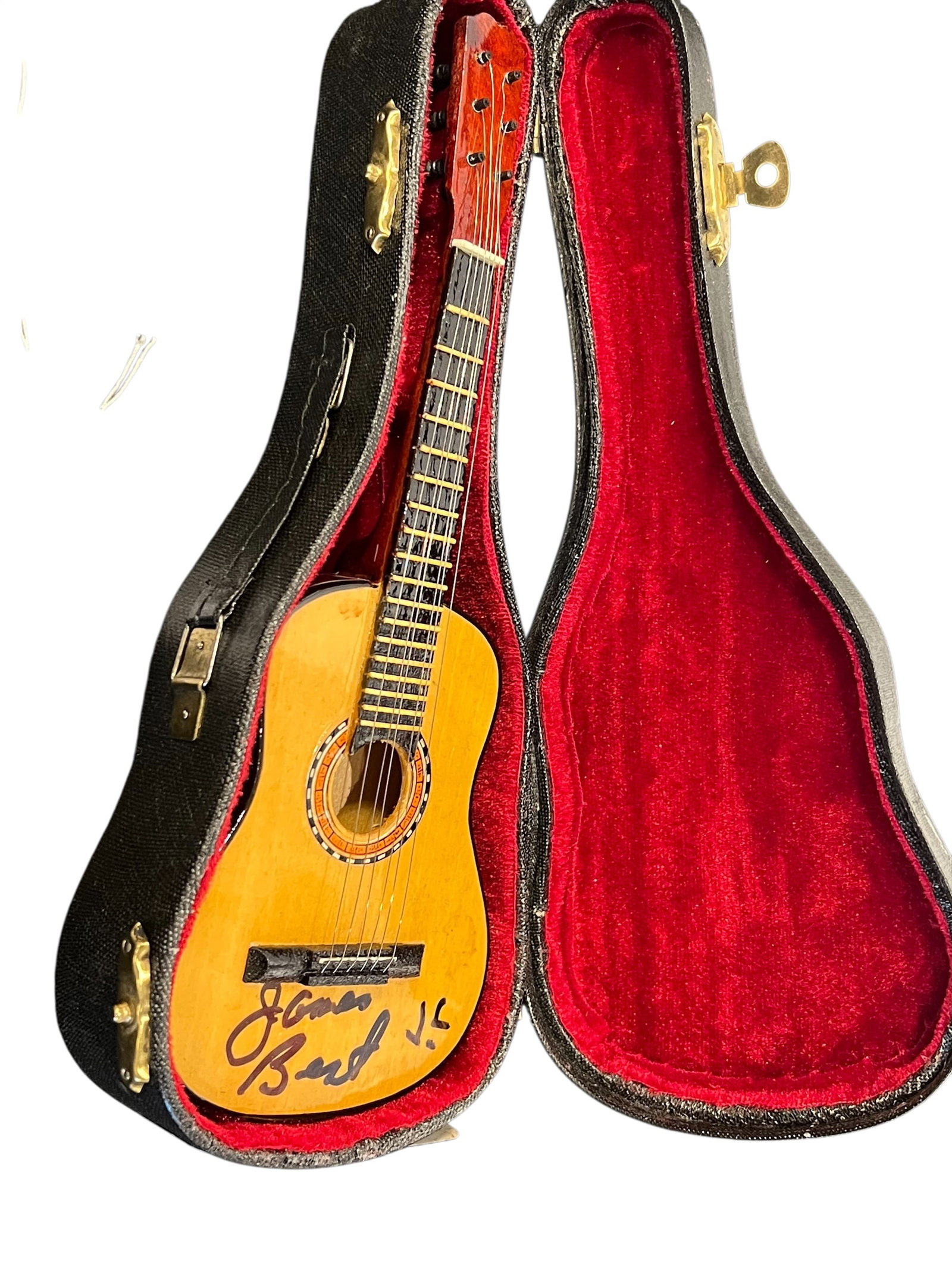 Signed Miniature Acoustic Guitar: This is a collectible 10-inch miniature replica guitar hand-signed by actor James Best, who notably played the character Jim Lindsey (a talented traveling guitar player) in early episodes of The Andy