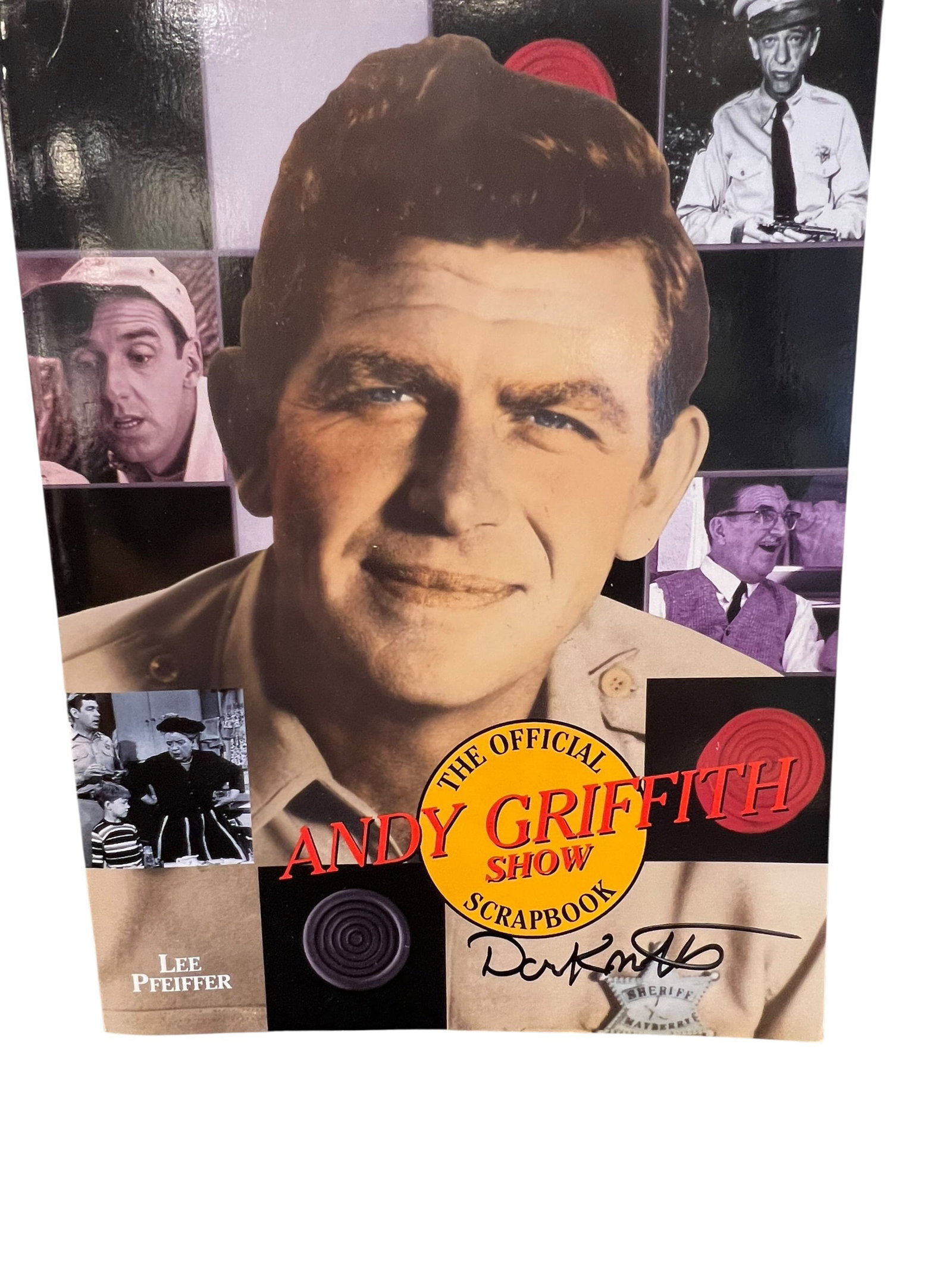 “The Official Andy Griffith Show Scrapbook: This image features the cover of "The Official Andy Griffith Show Scrapbook" by author Lee Pfeiffer, highlighting its 256 pages of television history and interviews.The paperback book was published