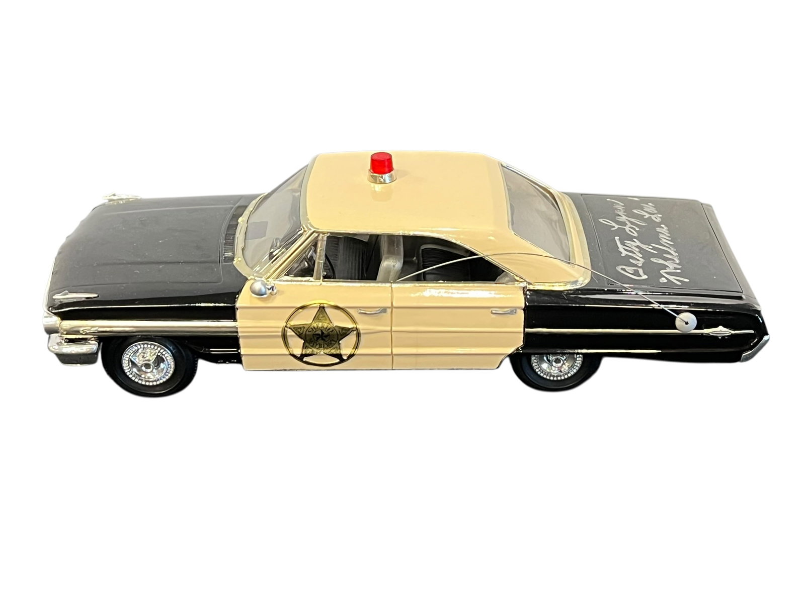Early 1960s Ford-Style Mayberry Sheriff's Patrol Car Model Autographed by Betty Lynn ("Thelma Lou"): Early Ford Fairlane Mayberry Sheriff's Car model personally autographed by Betty Lynn, beloved by generations of fans as Thelma Lou on The Andy Griffith Show. Betty added her character name, "Thelma L
