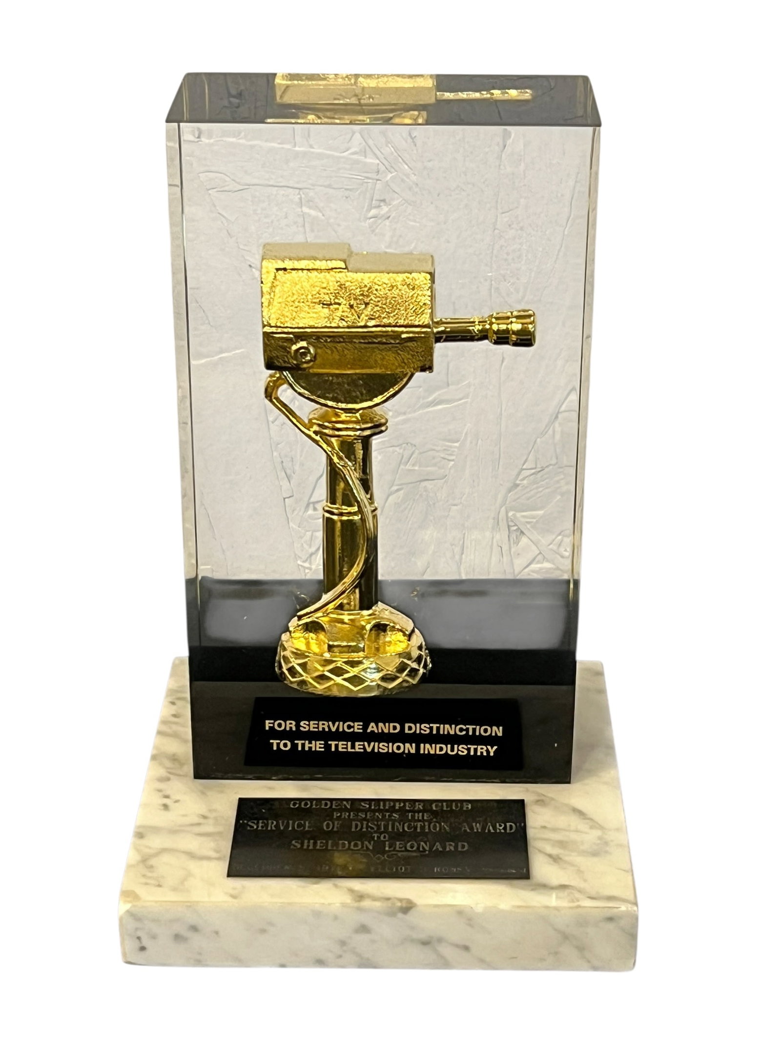 Golden Slipper Club Service of Distinction Award Presented to Sheldon Leonard: Presented to legendary producer, director, actor, and television pioneer Sheldon Leonard, this Golden Slipper Club "Service of Distinction Award" honors one of the most influential figures in