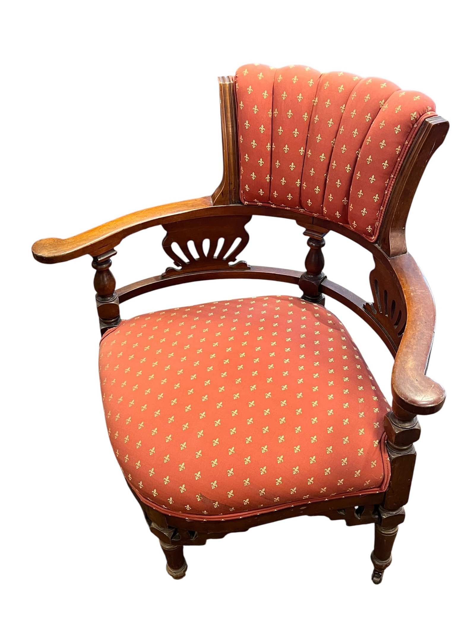Victorian Chair: This piece is an antique Victorian or Edwardian corner armchair, historically crafted around the late 19th to early 20th century. Designed with a distinctive diagonal diamond-shaped layout, these