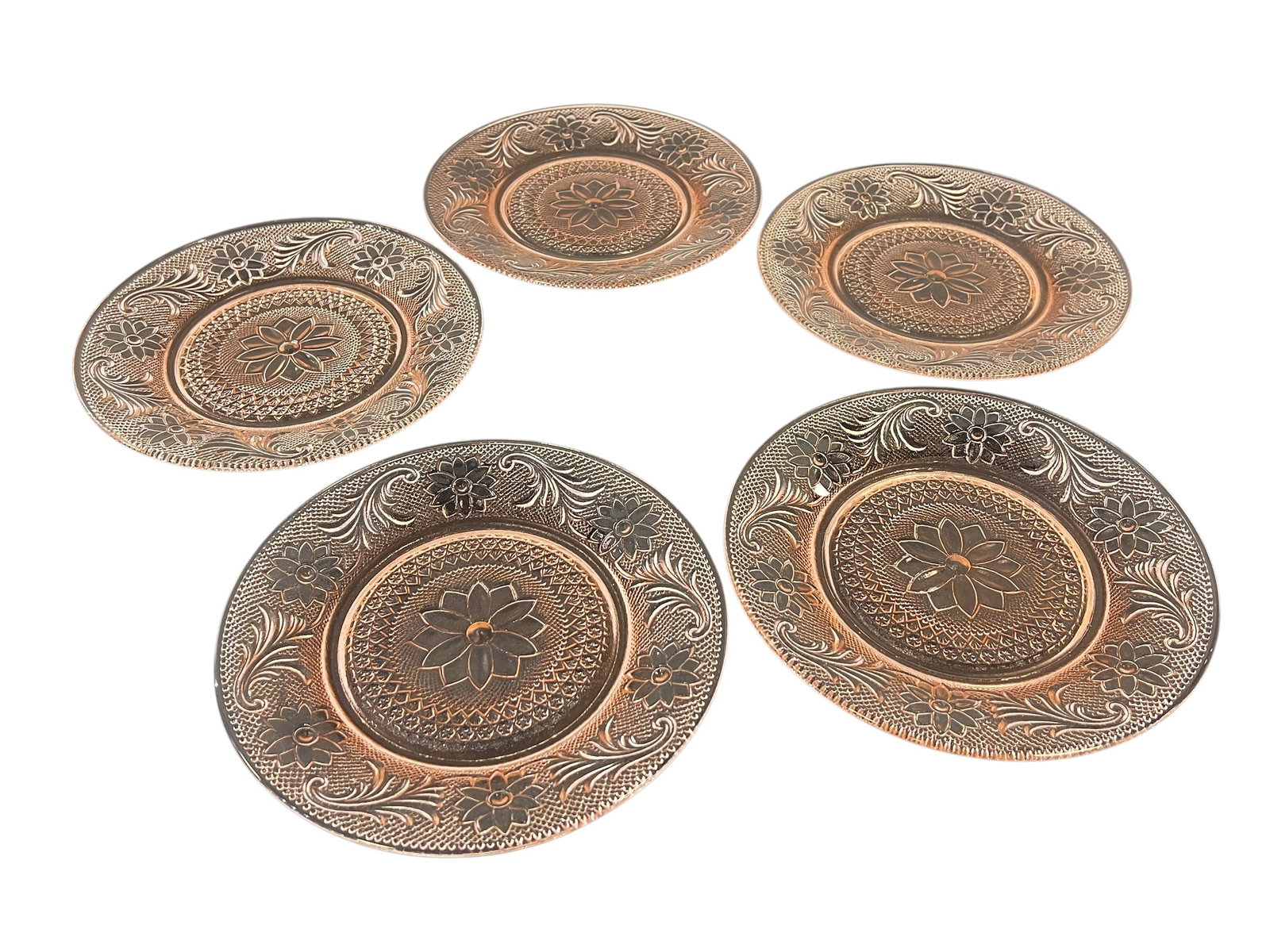 Lot of 5 Tiara Indiana Glass “Sandwich?? Pattern Snack Plates: These are vintage Tiara Indiana Glass "Sandwich" pattern oval snack plates in a peach-pink or amber-tinted colorway. Despite their metallic or copper-like sheen under specific warm lighting