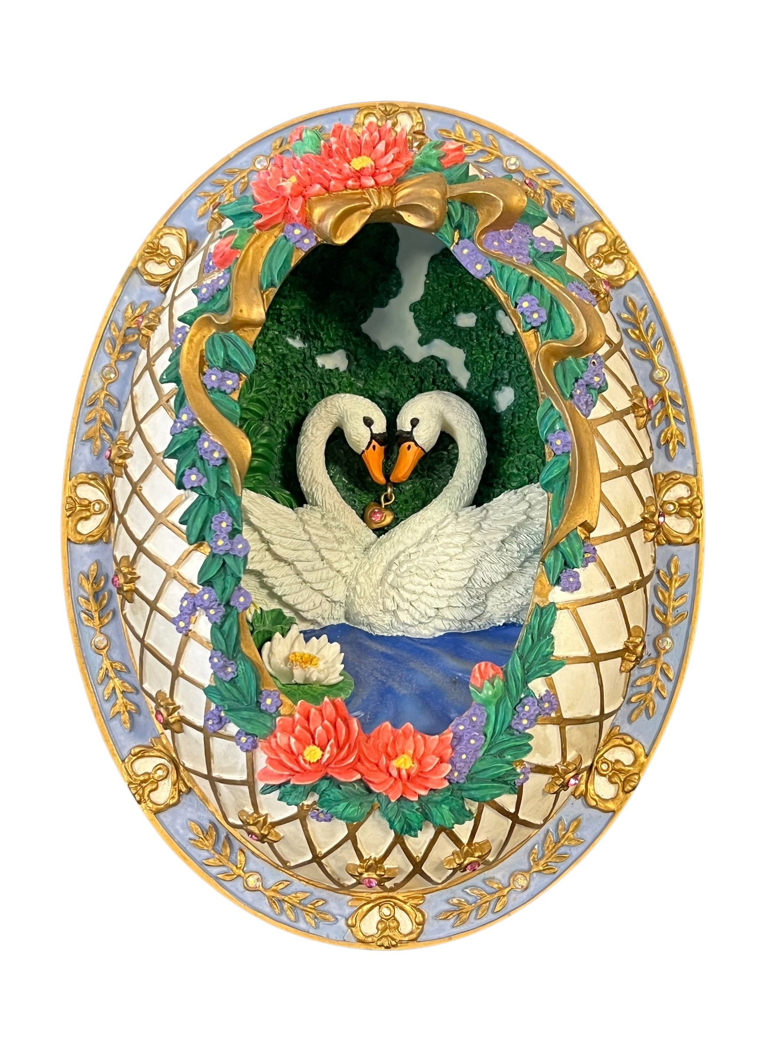 Royal Enchantments “The Gift?? Hanging Wall Plate: This collectible piece is "The Gift," which is the first issue in the Royal Enchantments 3D egg wall hanging collection released by The Bradford Exchange in 1994. [1]Key Details & FeaturesDesign Motif