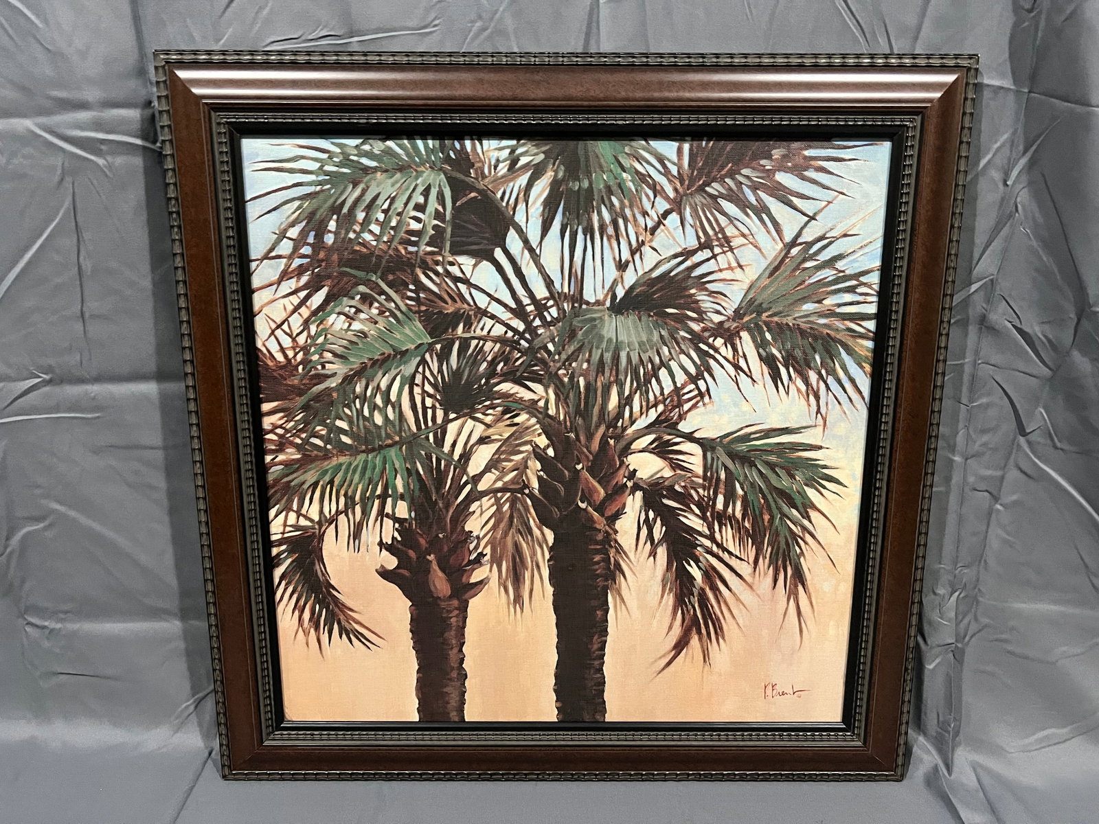 17Signed Paul Brent Palm Trees Print: The image features a framed art print titled "Twin Palms" by the well-known coastal and tropical lifestyle artist Paul Brent. It features a contemporary depiction of two prominent palm trees highlight