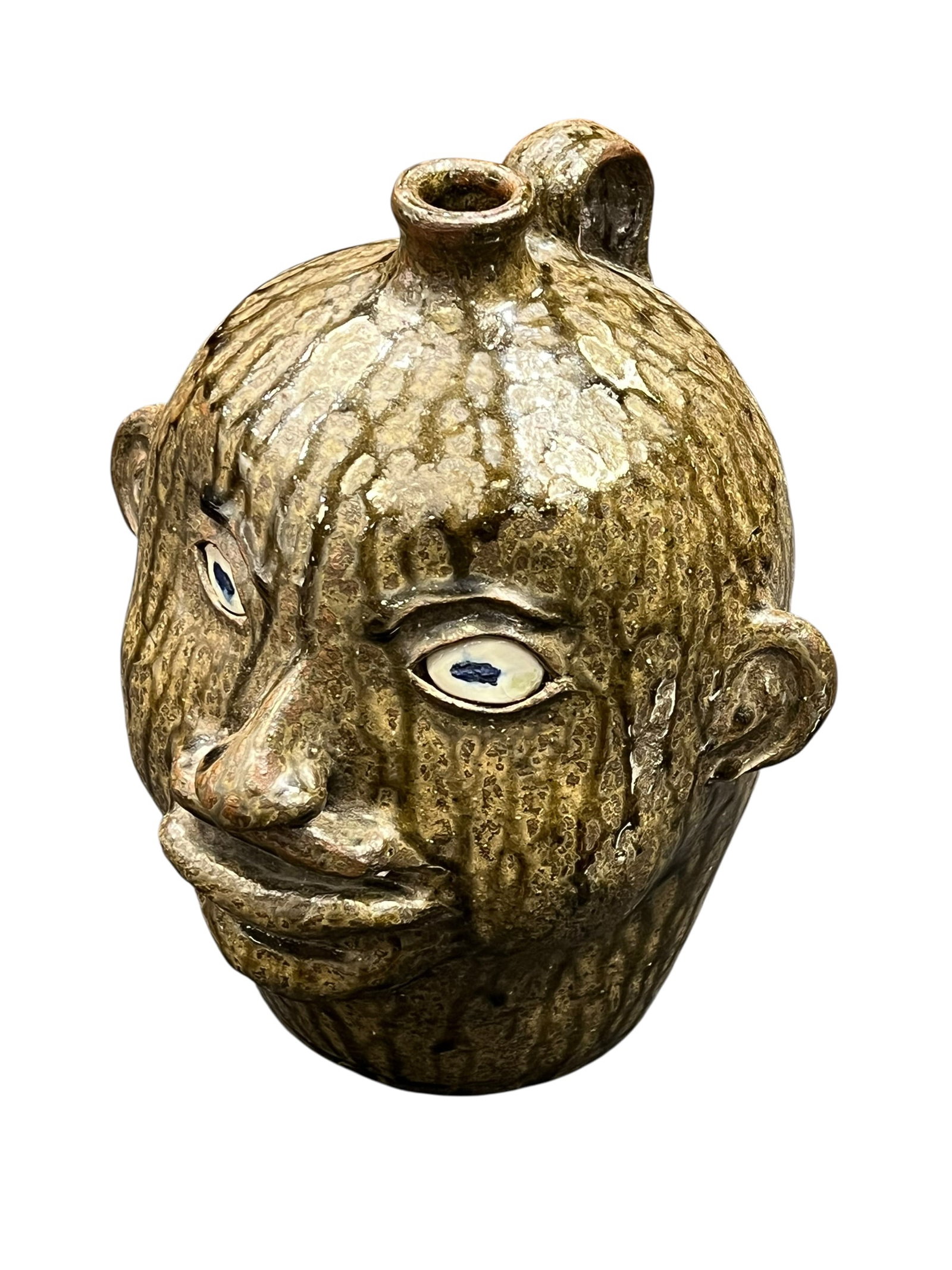 Signed Hewell Stoneware Face Jug: This image features a traditional Southern folk art face jug, a distinct form of American stoneware characterized by its expressive, stylized human features and rich alkaline glazing. [1, 2, 3, 4]Key