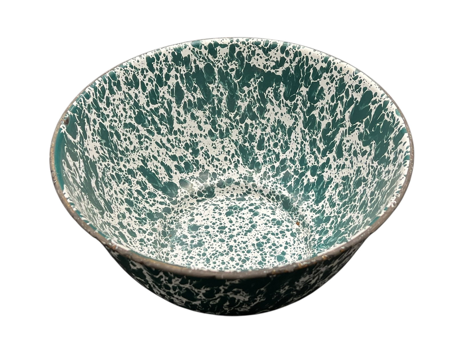 Green and White Speckled Splattereware Enamel Mixing Bowl: This green-and-white splatter design enamelware bowl features a classic porcelain-on-steel construction with a dark rim, characteristic of pieces made by brands like Crow Canyon Home. [1, 2]Material: