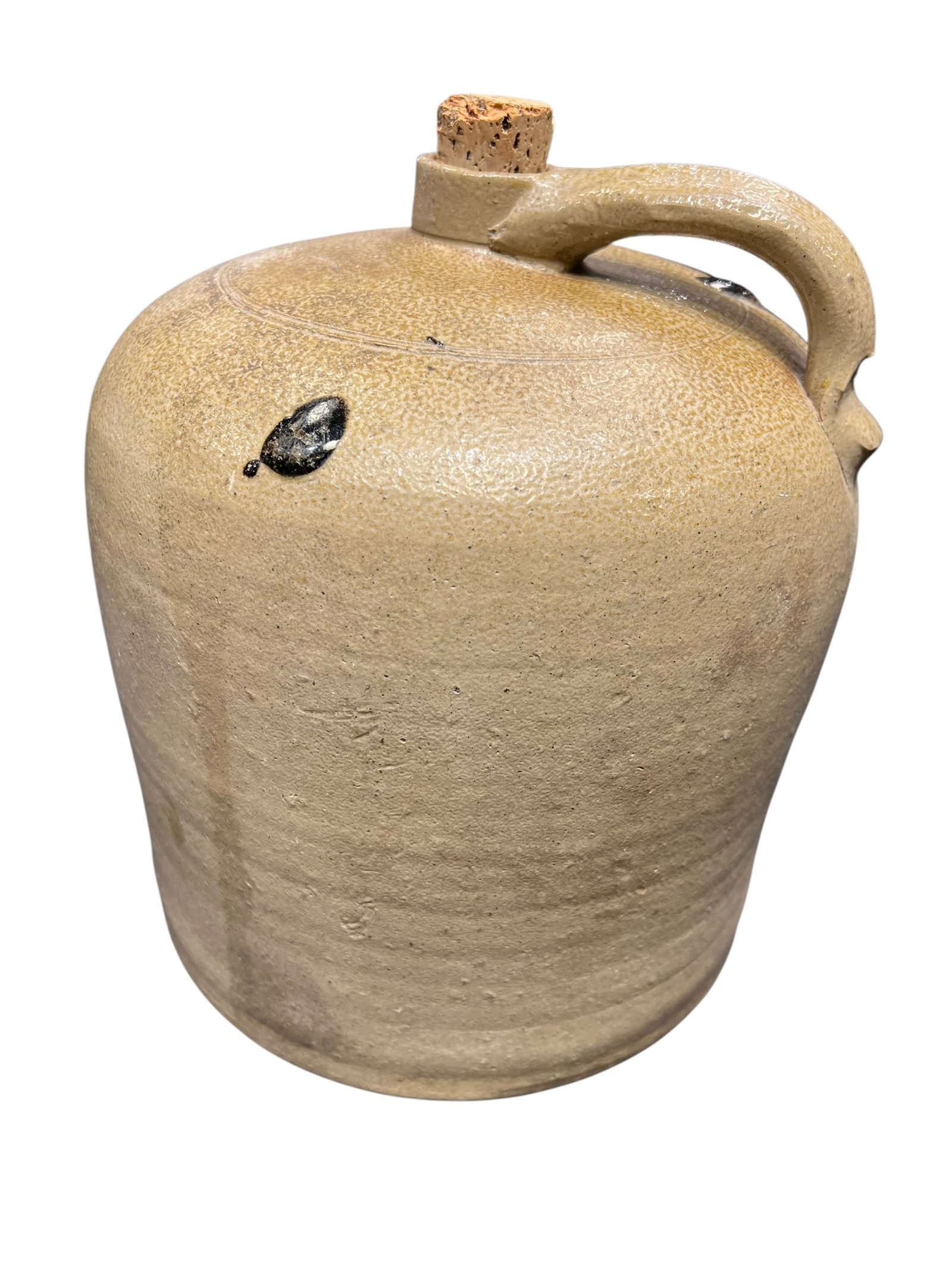 American Salt Glaze Stoneware Beehive Crock: This is an antique 19th-century American salt-glazed stoneware beehive whiskey jug featuring a rounded body, applied strap handle, and textured orange-peel glaze with kiln-firing residue ("turkey