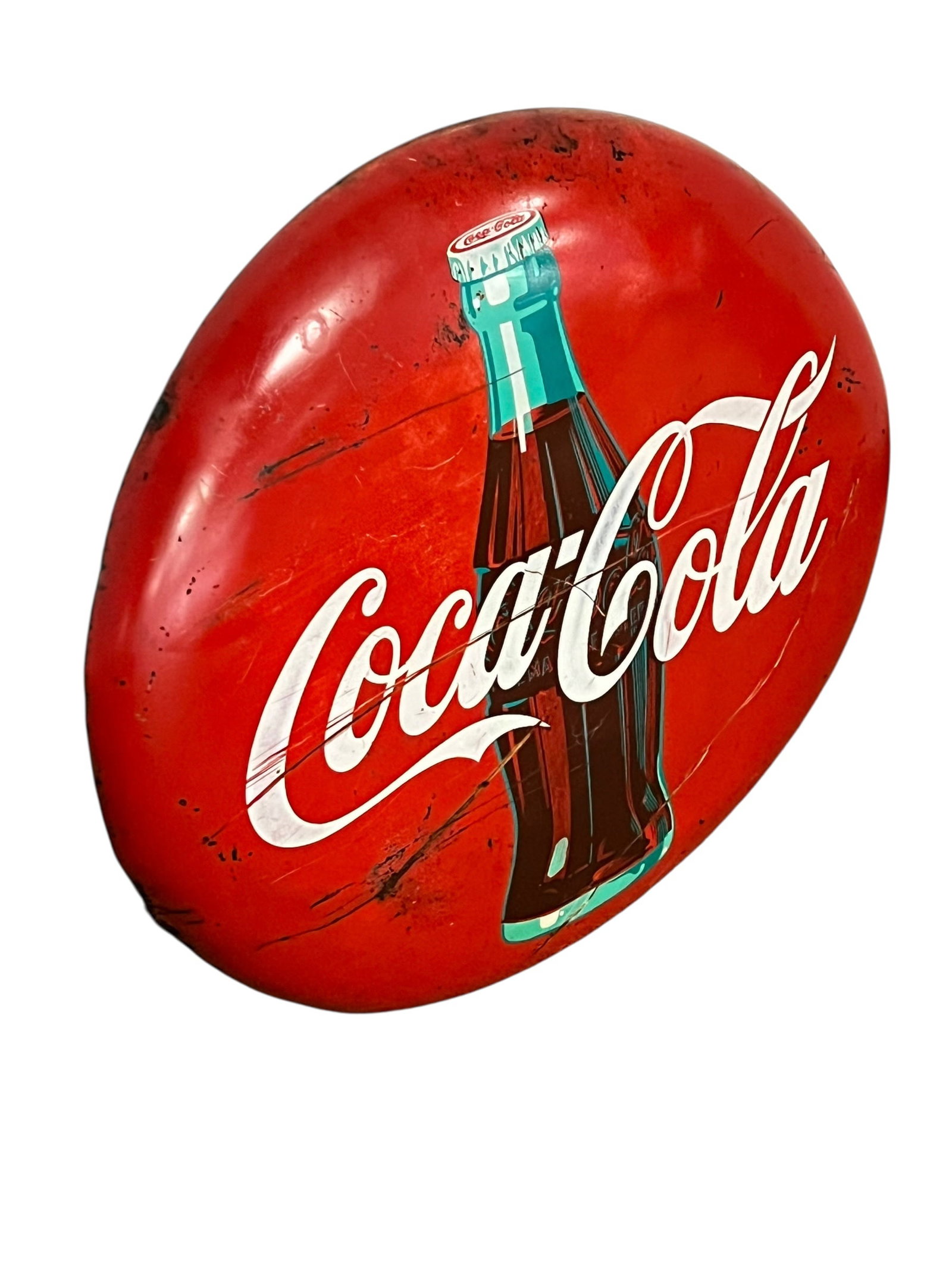 Vintage Coca Cola Button Sign 24": This is a vintage mid-century Coca-Cola "button" advertising sign, typically featuring a convex enameled or painted metal/porcelain design with a contour bottle graphic and the classic white script lo