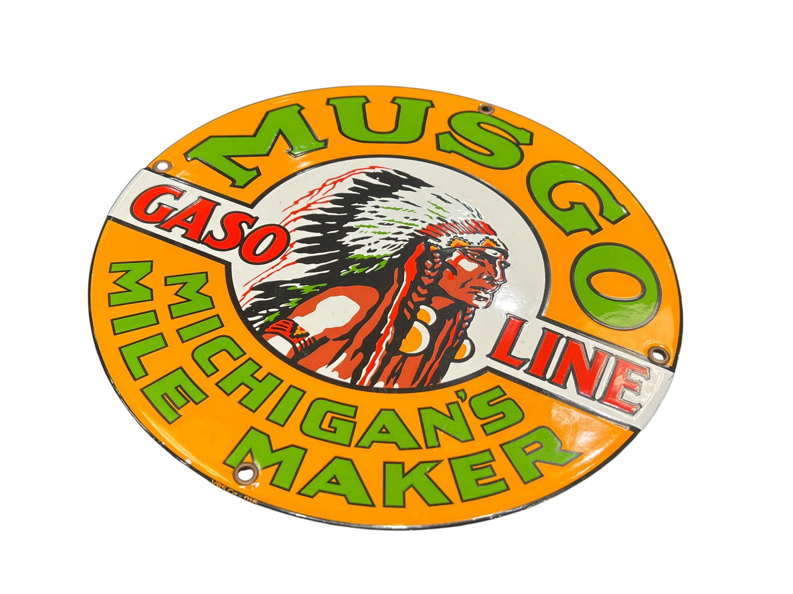 Musgo Gasoline Reproduction Porcelain Advertising Sign: The image shows a round porcelain sign for Musgo Gasoline, known as "Michigan's Mile Maker," featuring a central graphic of a Native American profile in a headdress. Original vintage pieces of this