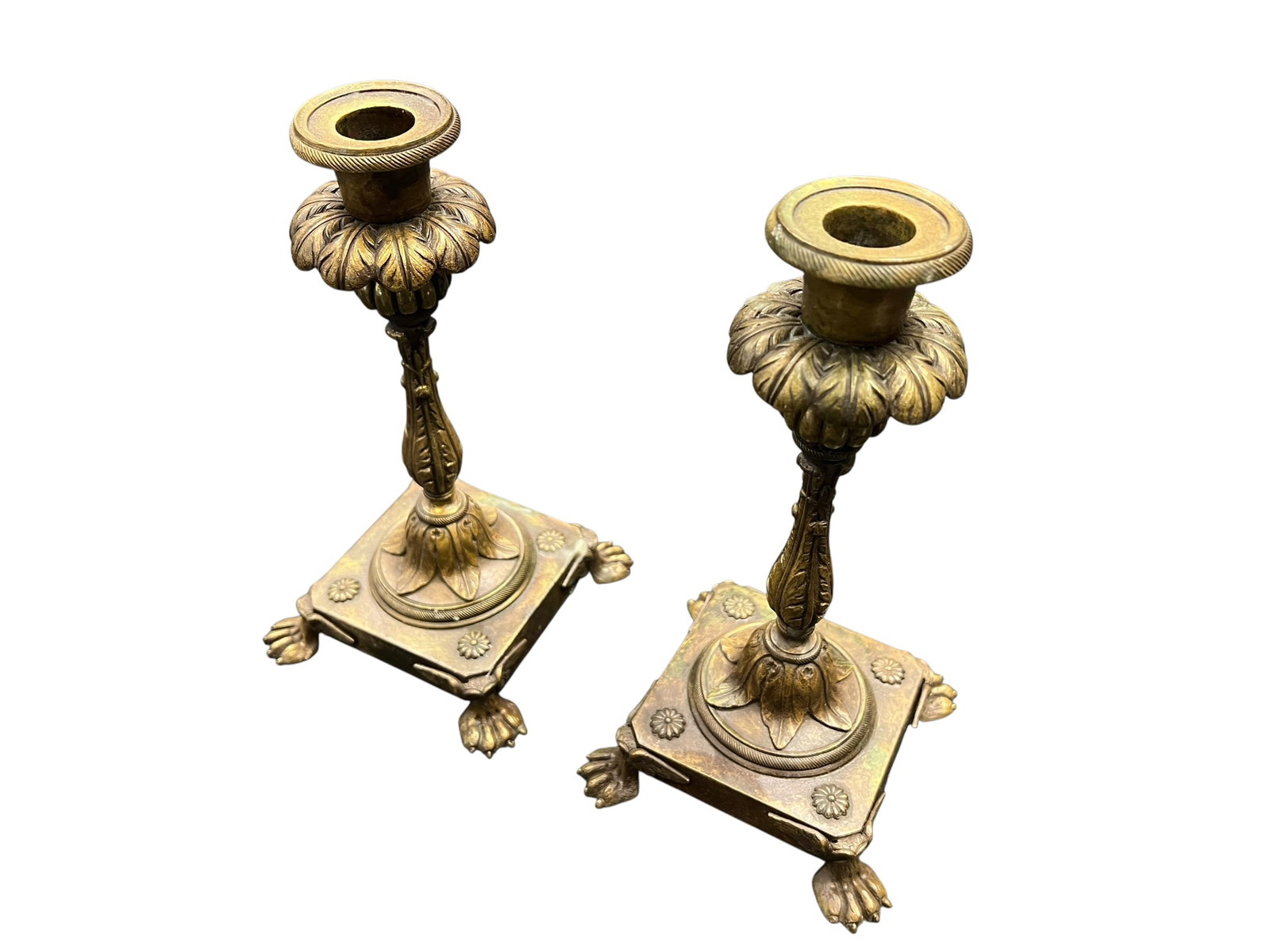 Pair of Tiffany & Co Brass/Bronze Candle Holders: This image shows a stunning pair of antique cast brass or gilded bronze candlesticks styled in a Neoclassical or Empire Revival aesthetic.Key Design Elements & FeaturesBases with Lion Paw Feet: The sq