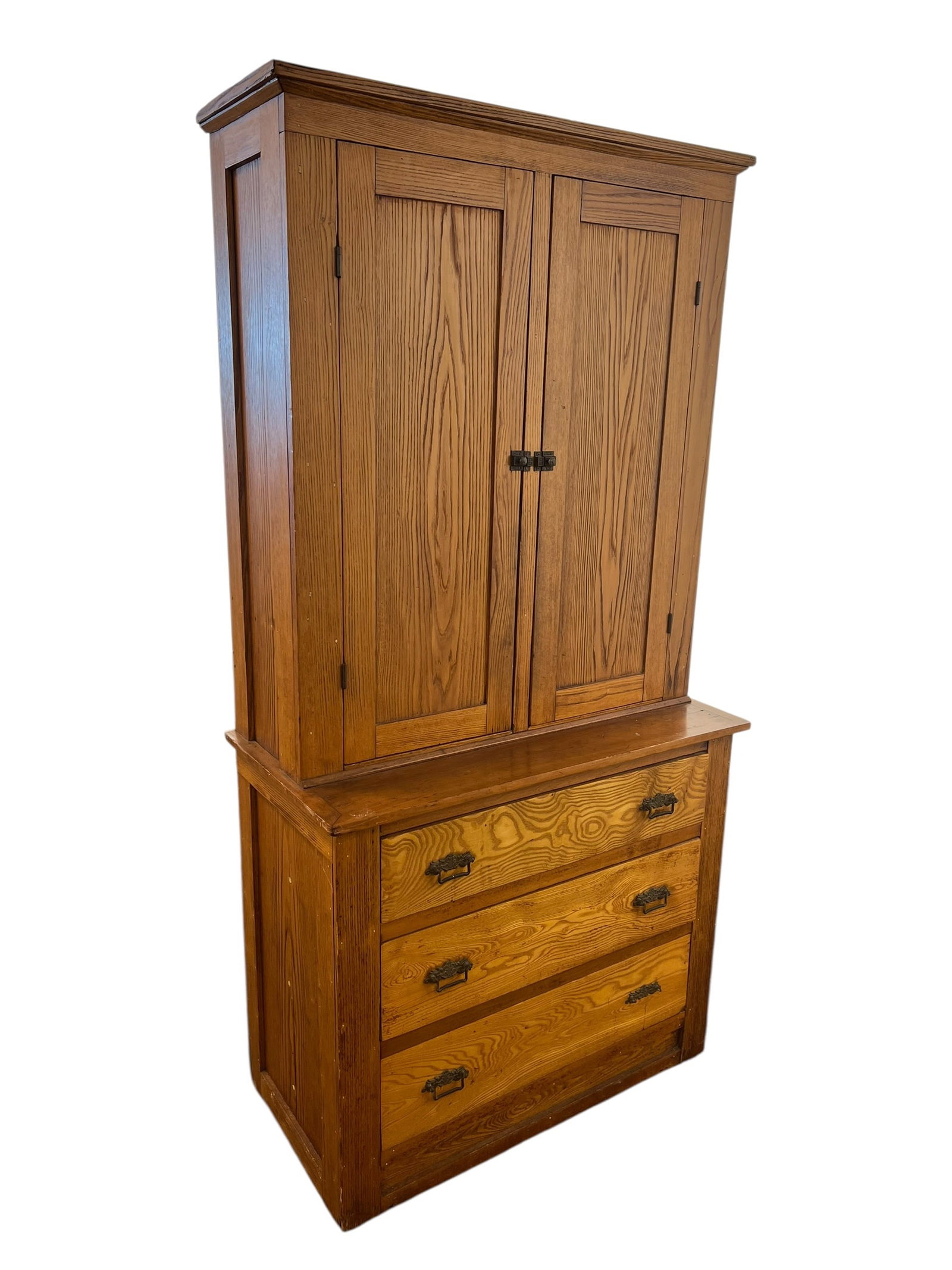 Oak Stepback Cupboard: This two-piece solid oak furniture piece is a traditional Craftsman or Mission-style combination armoire and dresser, featuring a dual-door upper wardrobe cabinet set atop a three-drawer lower chest w