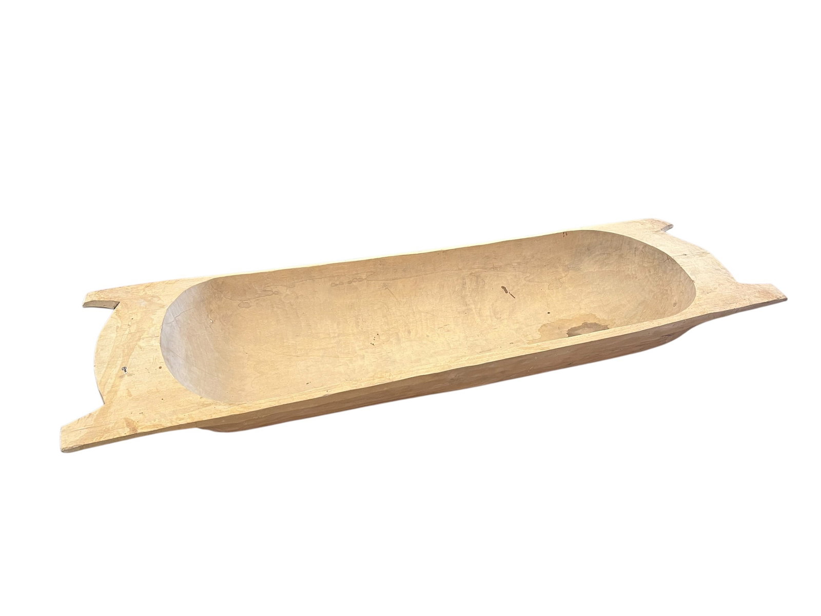 Dough Bowl: This is an antique hand-hewn wooden dough bowl, also known as a bread trencher or kneading trough, typically carved from a single piece of solid wood with primitive end handles. [1, 2, 3]Key
