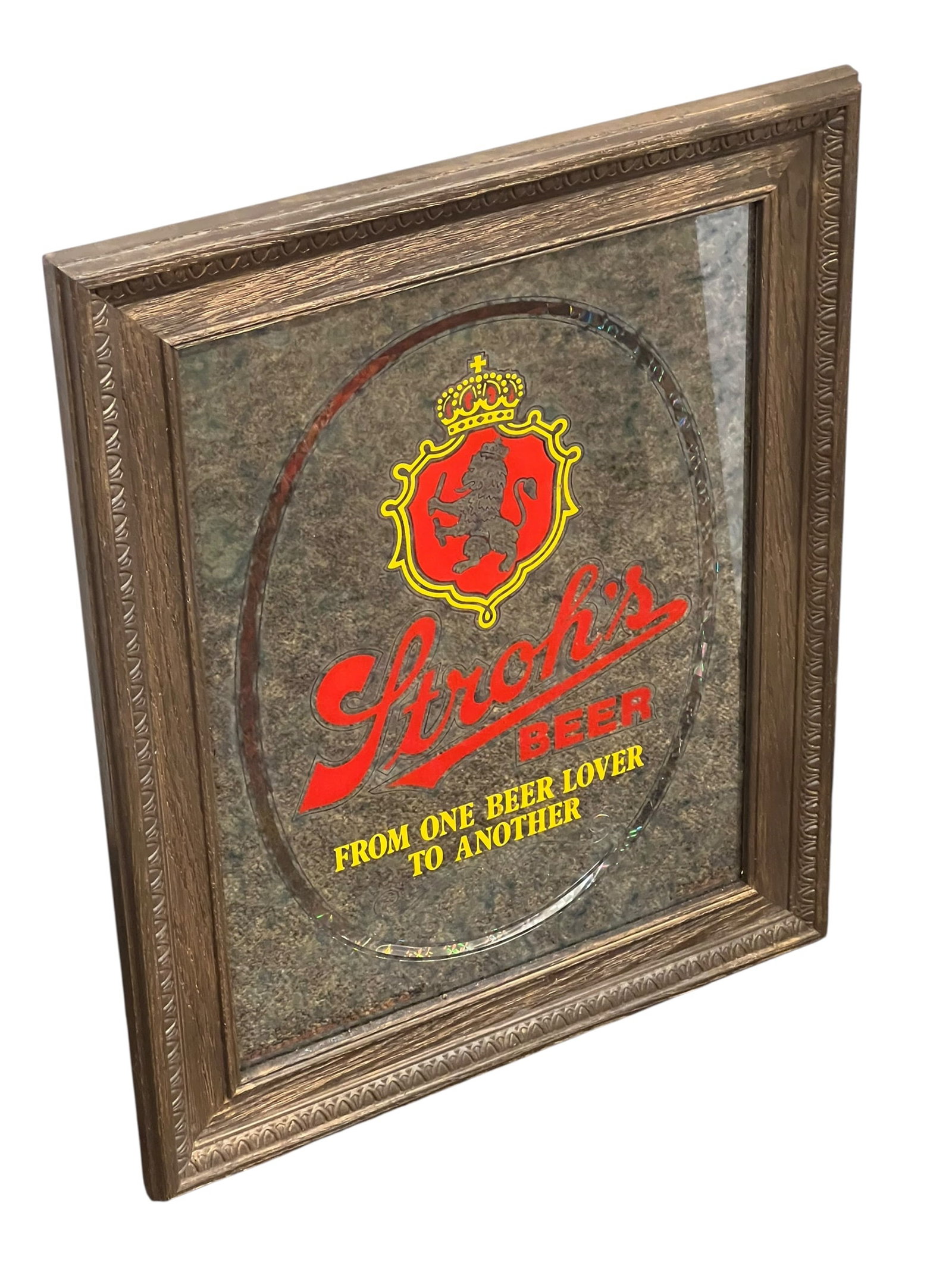 Stroh’s Beer Advertising Light: This is a vintage 1980 Stroh's Beer "From One Beer Lover to Another" lighted mirror bar sign featuring an ornate wood frame and the iconic red lion crest. [1, 2]Item: Vintage Stroh's Beer Lighted