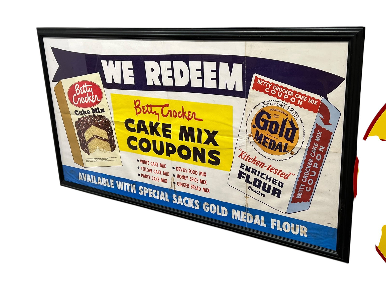 Betty Crocker Advertising Poster: This framed vintage grocery sign promotes Betty Crocker cake mix coupons that could be redeemed using special sacks of Gold Medal Flour. [1]Key DetailsFeatured Products: Betty Crocker cake mixes