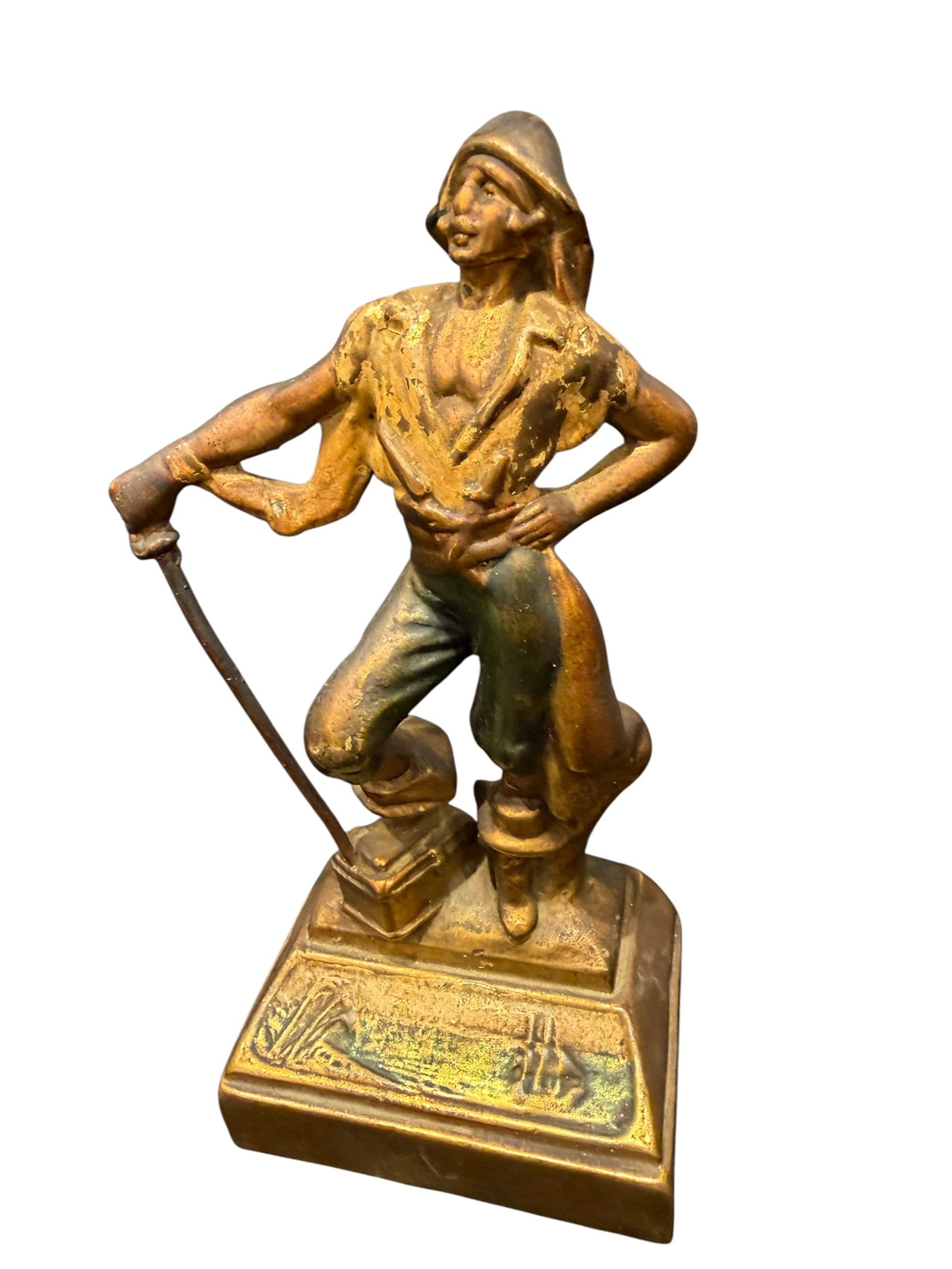 Bronze Clad Pirate Bookend: This is an antique bronze-clad figural pirate bookend designed by artist Paul Herzel and produced by the Pompeian Bronze Company or Armor Bronze during the late 1920s. [1, 2, 3]Design: Depicts a swash