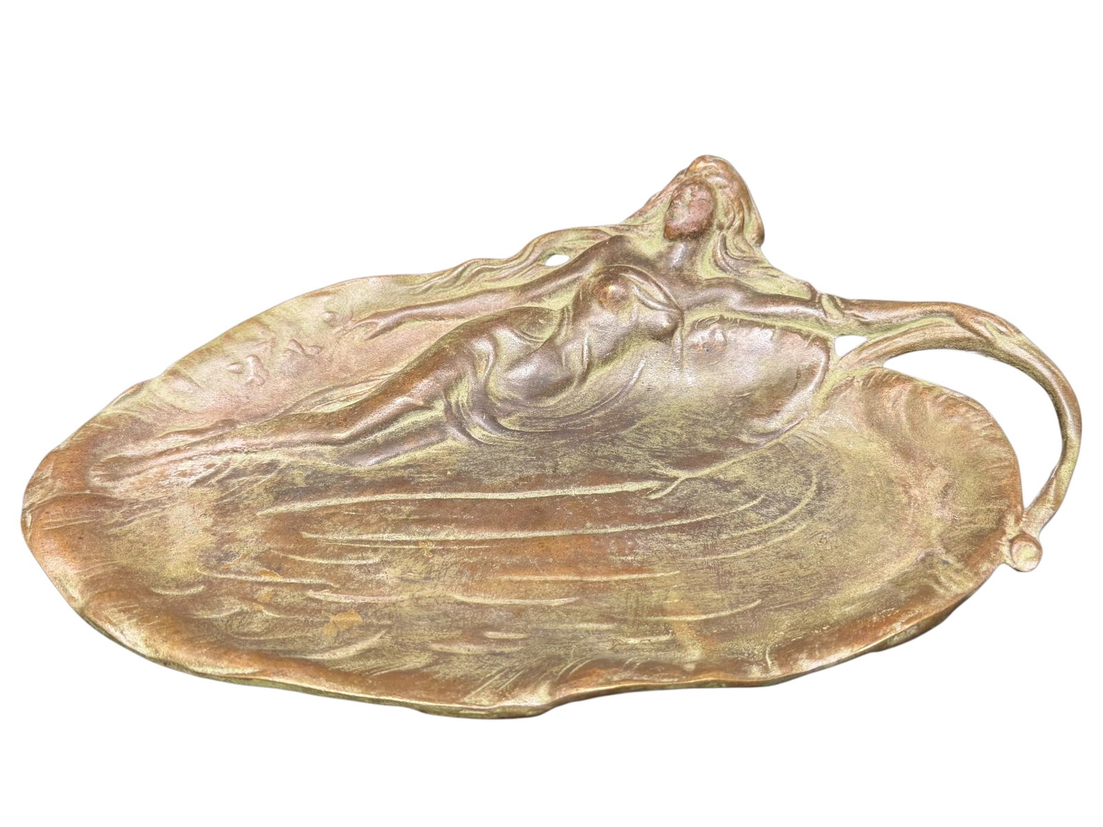 Art Nouveau Solid Brass Decorative Tray: This object is an antique Art Nouveau figural tray, traditionally used as a vide-poche (change/trinket dish), a card-receiving tray, or an ashtray. [1, 2, 3]Design & CharacteristicsStyle: Pure Art Nou