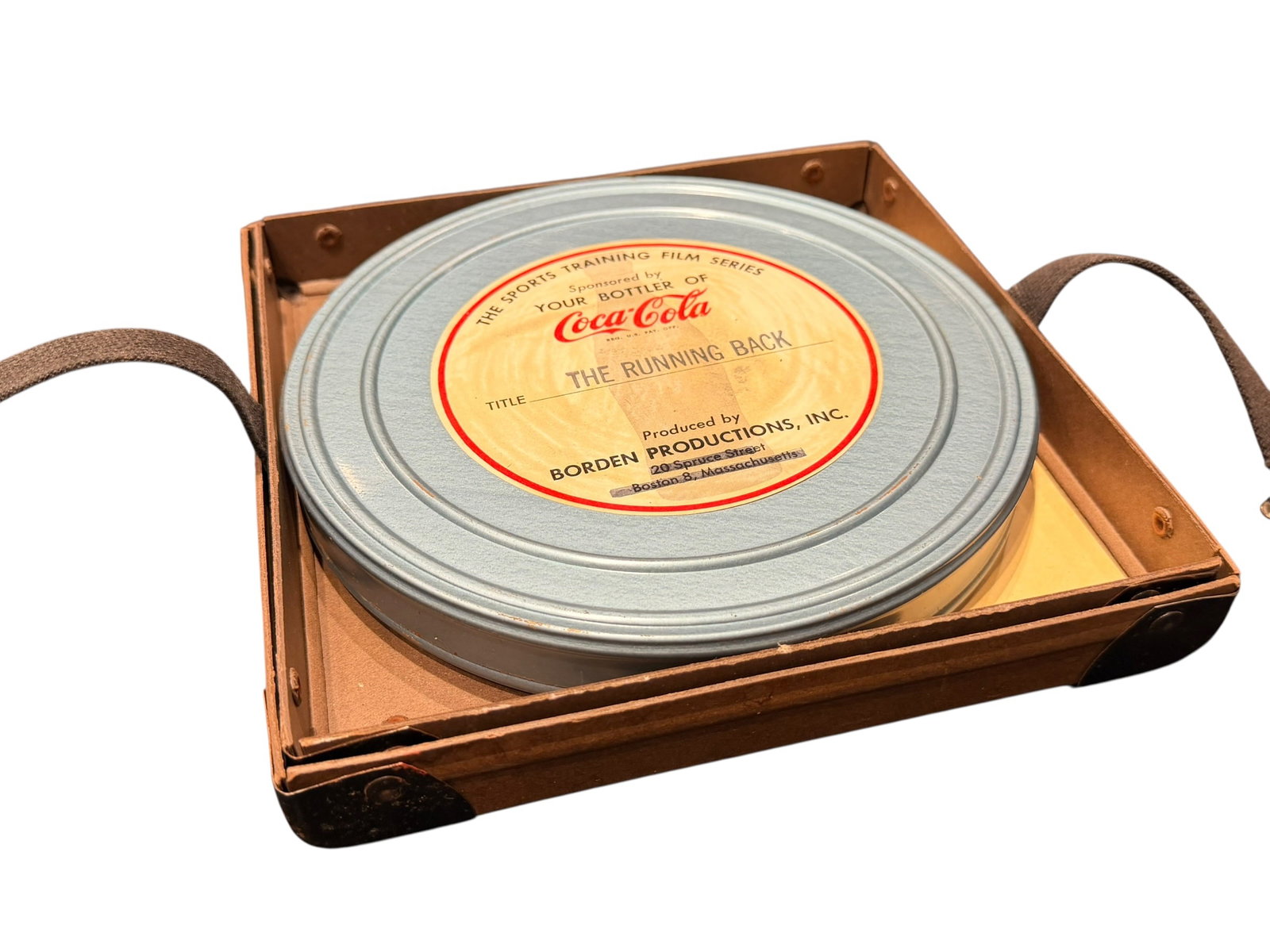 16mm Canister Coca Cola Sports Training Film Series Titled “The Running Back: This is a vintage 16mm film canister from the Coca-Cola Sports Training Film Series, specifically titled "The Running Back" and produced by Borden Productions, Inc. in Boston, Massachusetts. [1, 2]Key