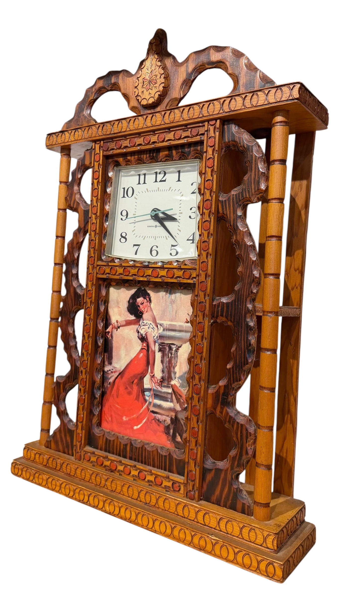 Howard Finster Clock: This vintage folk art shelf clock was handcrafted by renowned Georgia outsider artist Reverend Howard Finster (1916–2001), featuring his signature chip-carved and wood-burned tramp art style. [1,