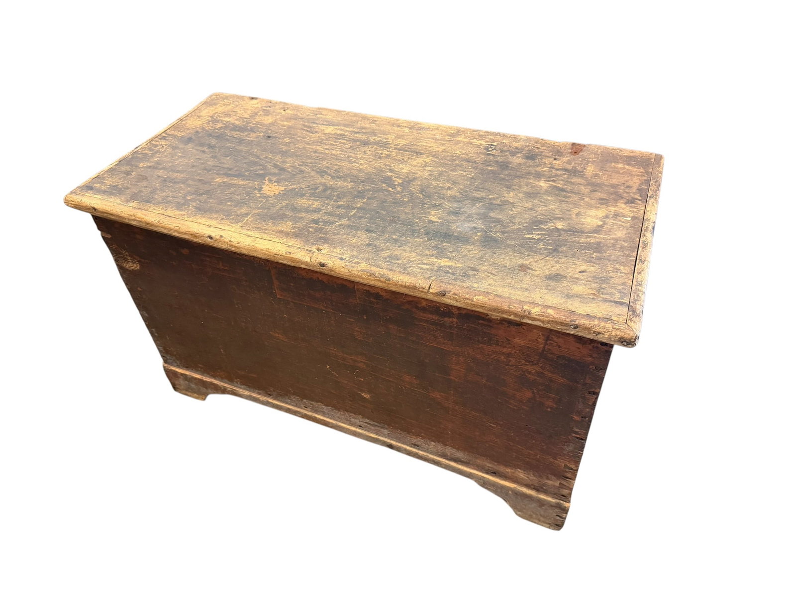 Early Primitive Georgia Pine Sugar Chest: Appears to be an antique primitive wooden blanket chest or storage trunk, likely crafted from pine or a similar softwood with visible surface wear and a distressed patina. [1, 2]Features a