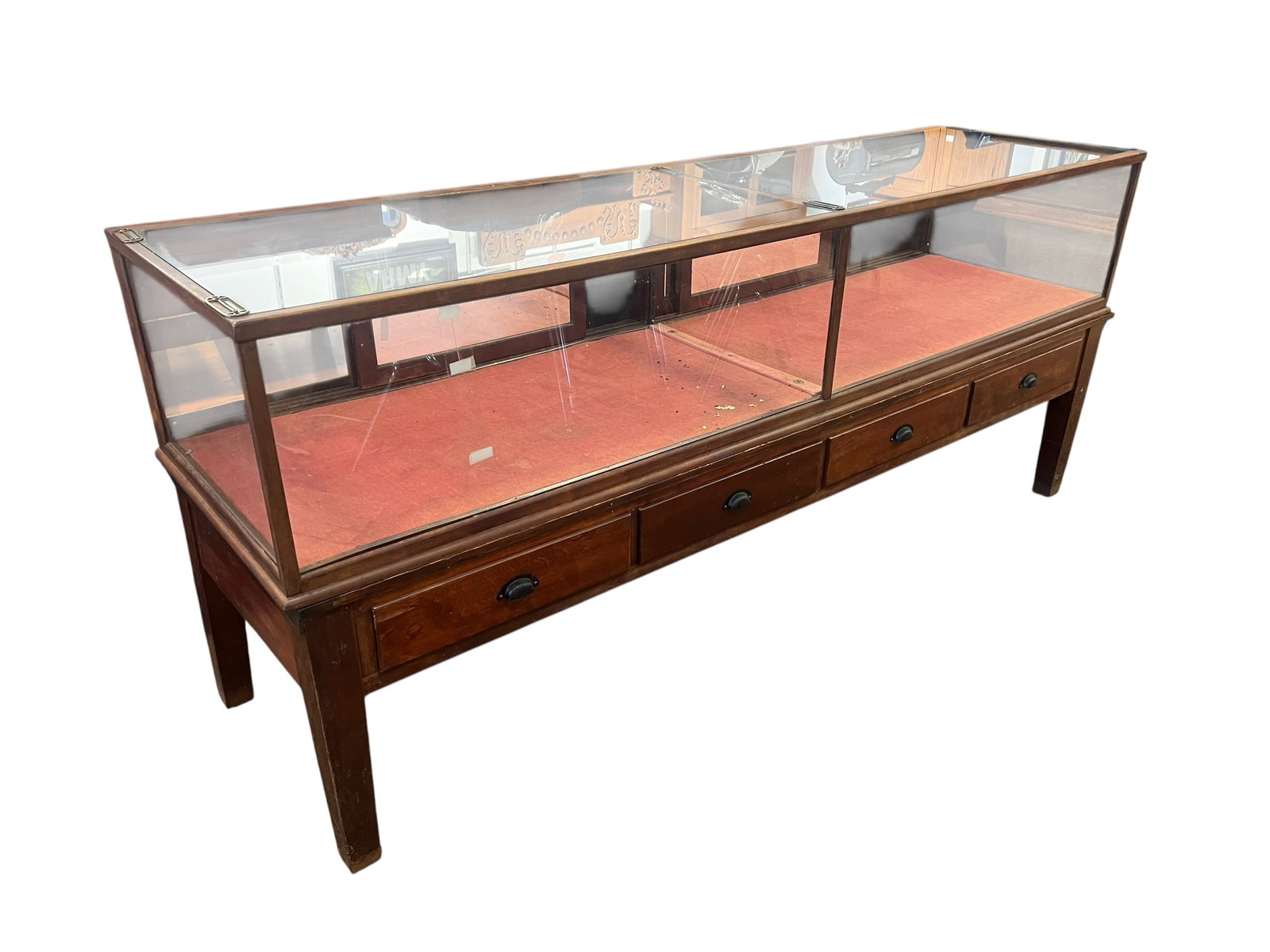 Large Oak Display Case: This piece appears to be an antique wooden and glass general store showcase or mercantile counter featuring a glazed top display area and integrated base drawers. [1, 2]Design & Materials: