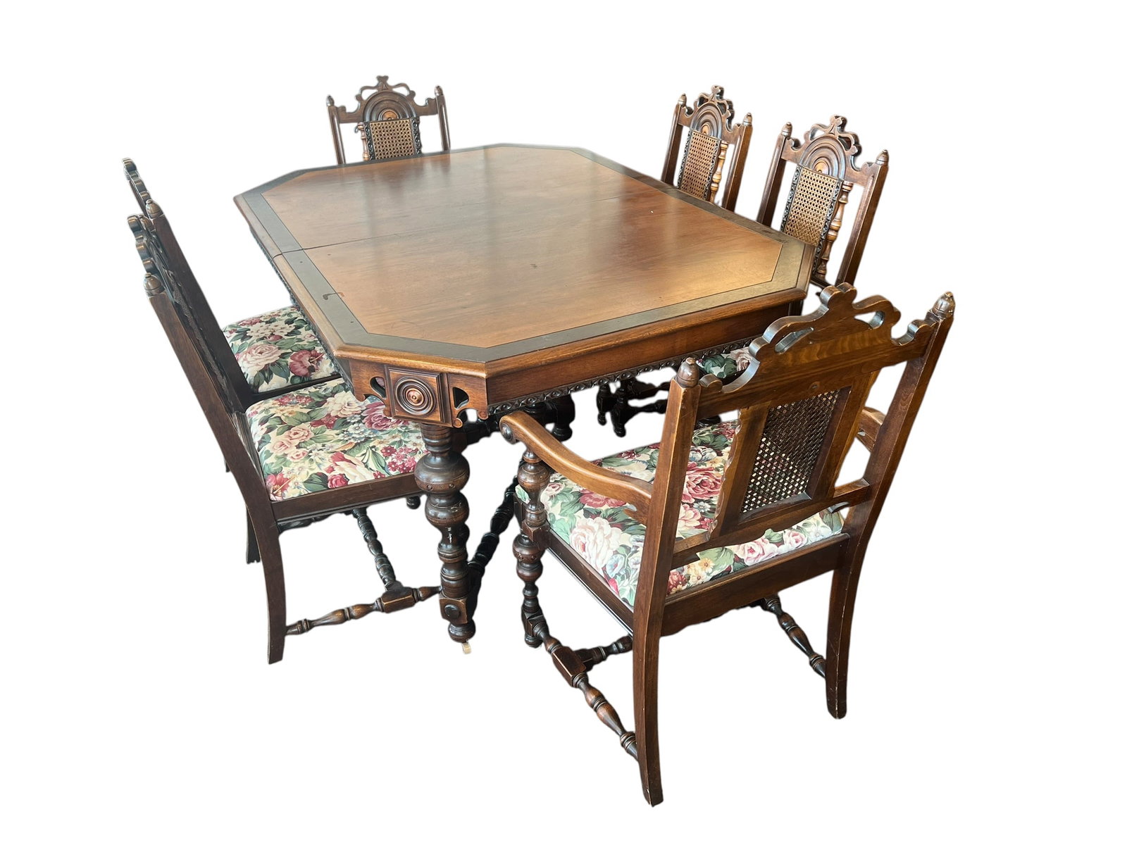 Walnut Jacobean Style Diningroom Table and 6 Chairs: This image shows an antique 1920s Jacobean Revival dining room set. [1, 2]Key Characteristics & FeaturesDesign Period: Typically produced during the 1920s to 1930s as a historical revival of early